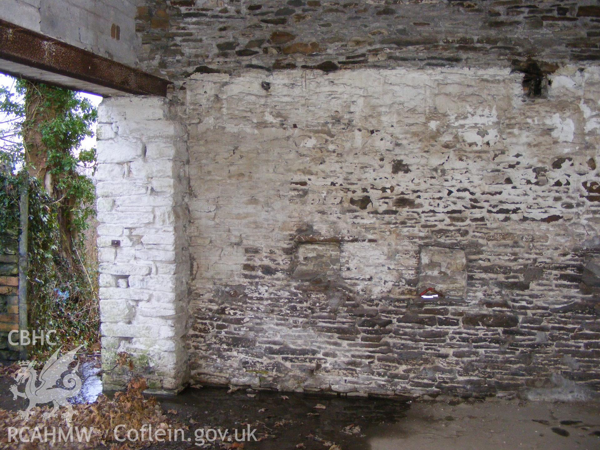 Digital photograph from an archaeological evaluation for a barn conversion and watching brief on a sheepfold at Mynachdy Farm, Ynysybwl December 2008; by S. Mayes and D. Rouse, Archaeological Investigation Ltd.