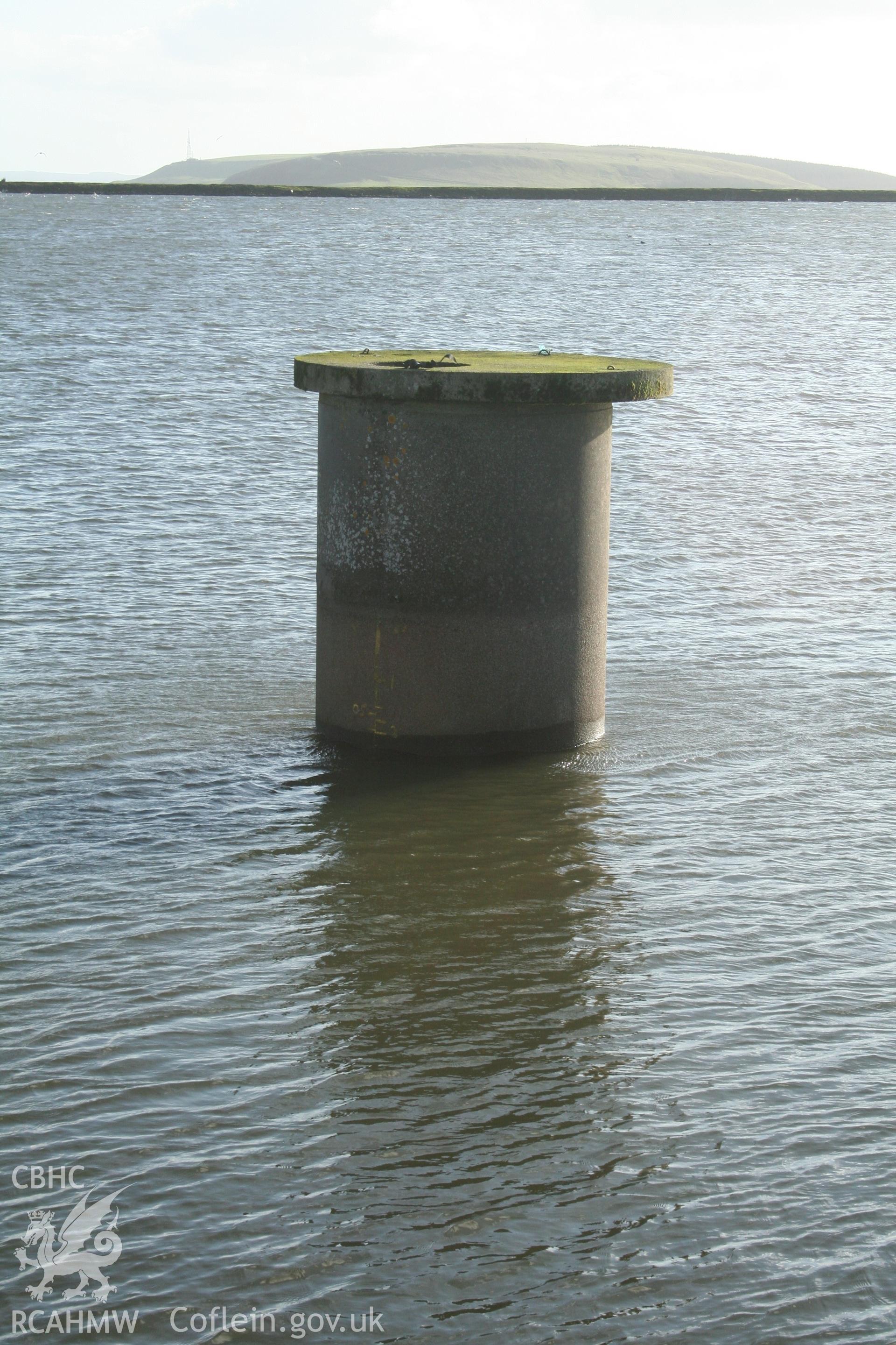 Digital image of Rhaslas Pond and the surrounding area: View of the straining tower from the top of the north dam.