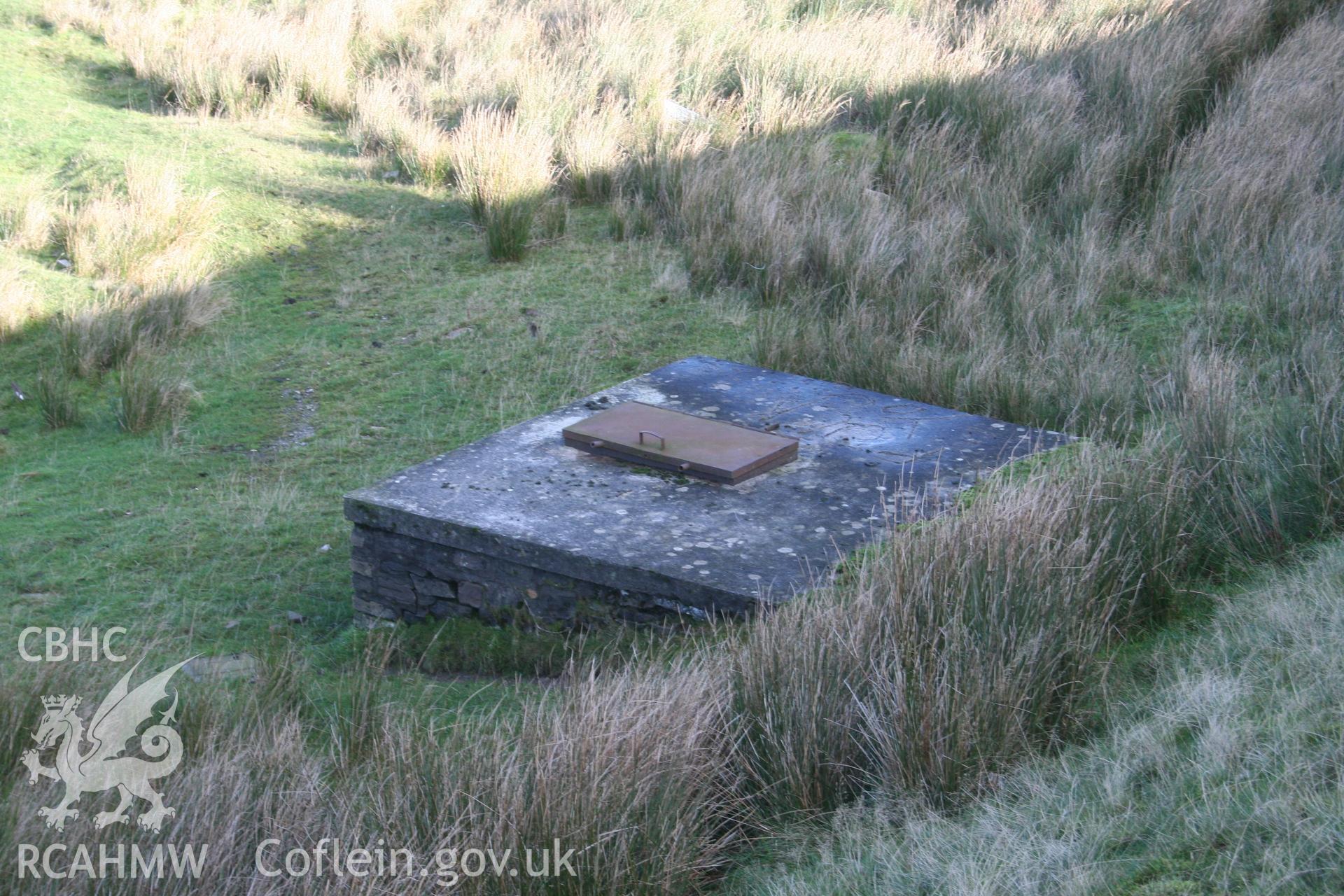 Digital image of Rhaslas Pond and the surrounding area: View of the filter house from the top of the north dam.