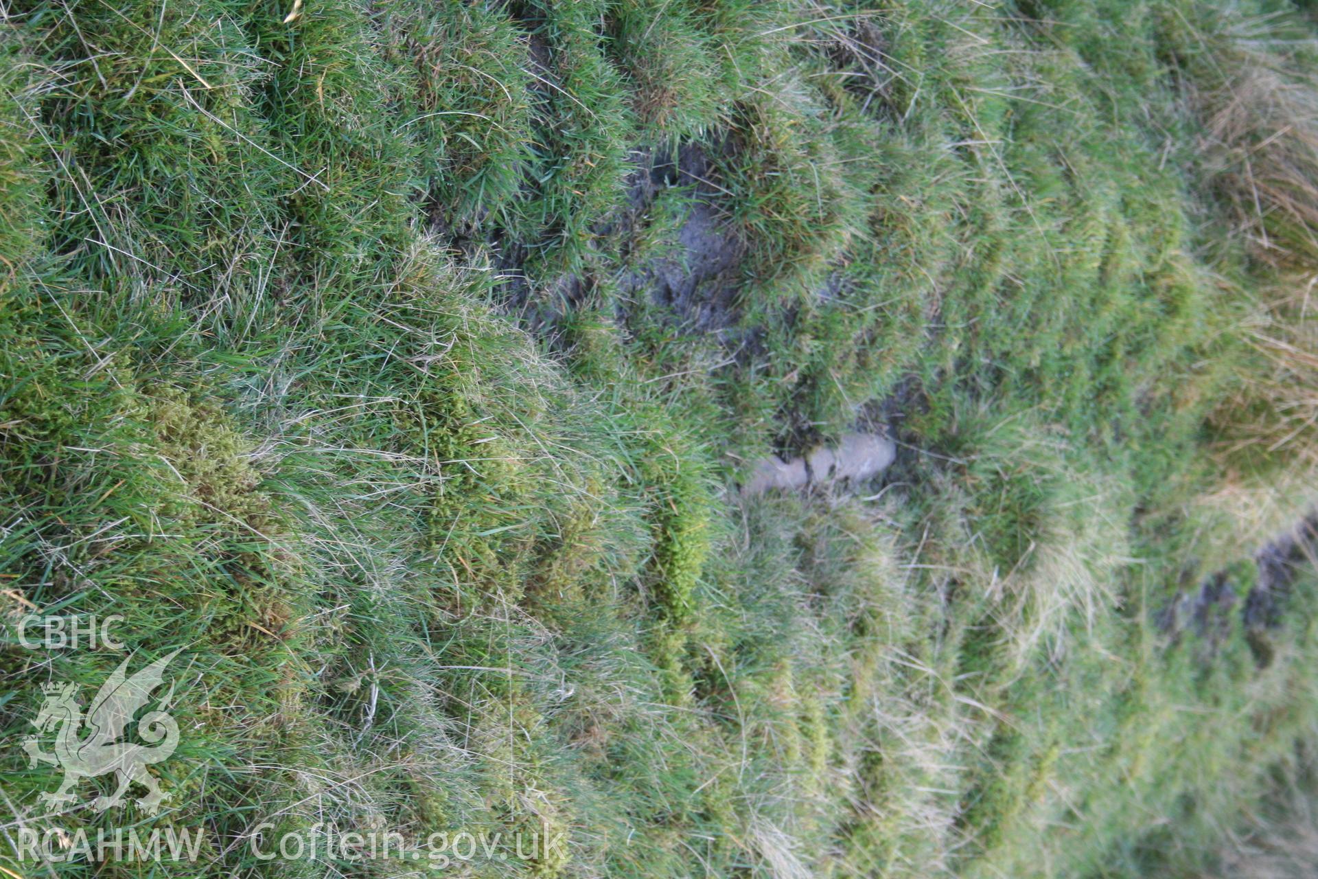 Digital image of Rhaslas Pond and the surrounding area: Close-up view of the exposed pipeline.