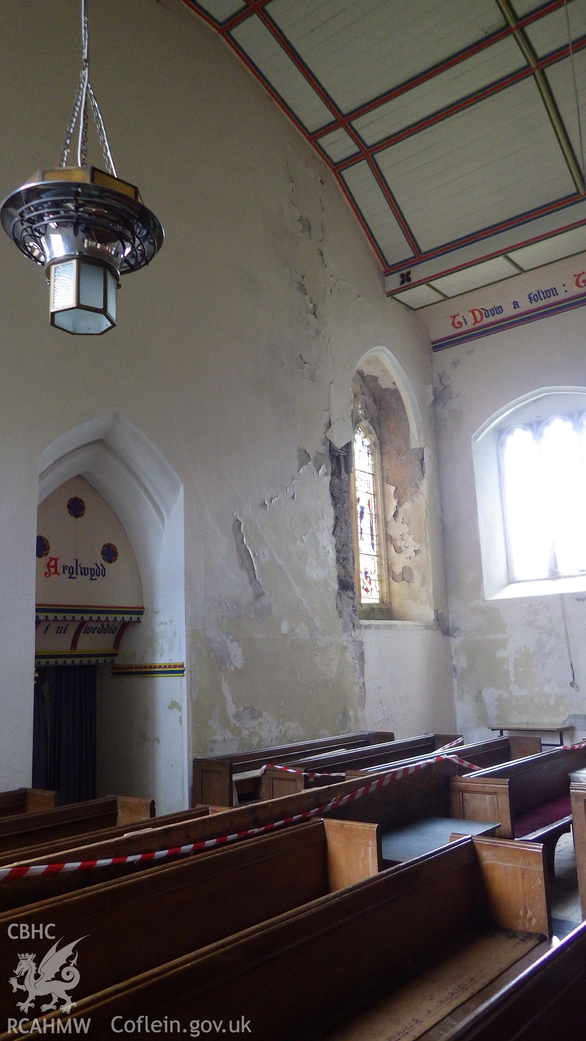 Water damage to the western end of nave, northwest corner (where joins tower)