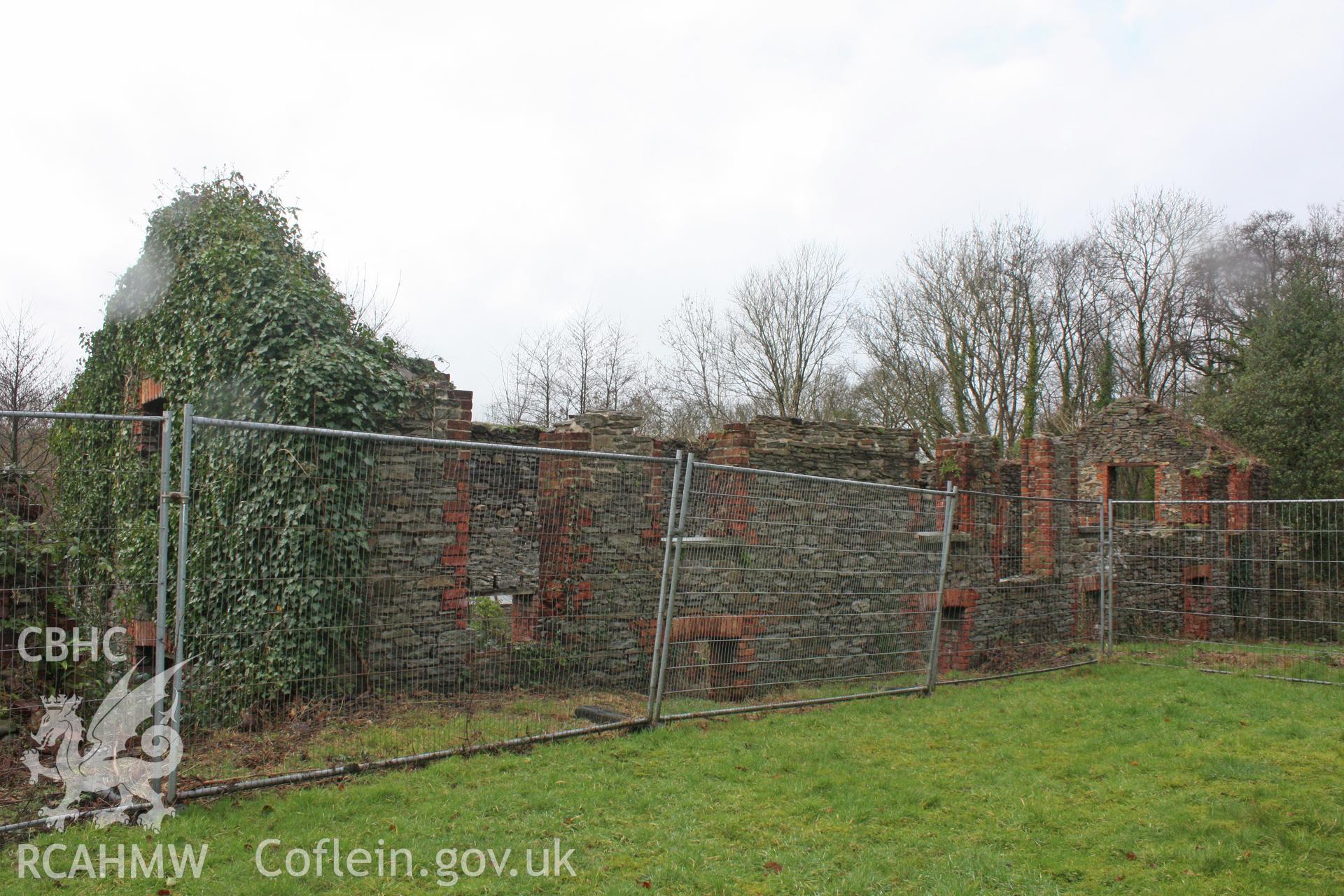 Large workshop at north end of site from south-east