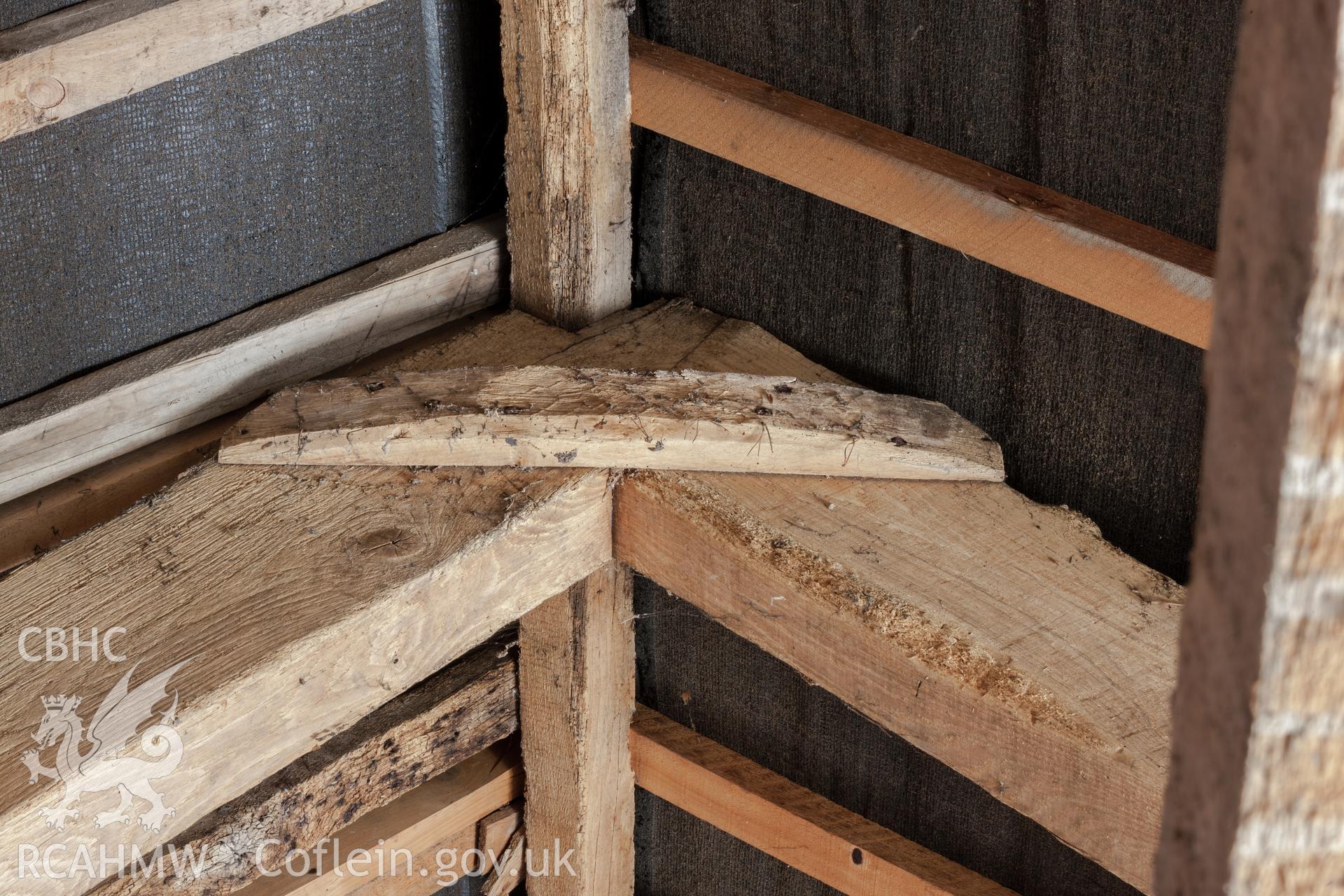 Detail in southeast roof of pegged mortice joint in truss, with nailed reinforcing added