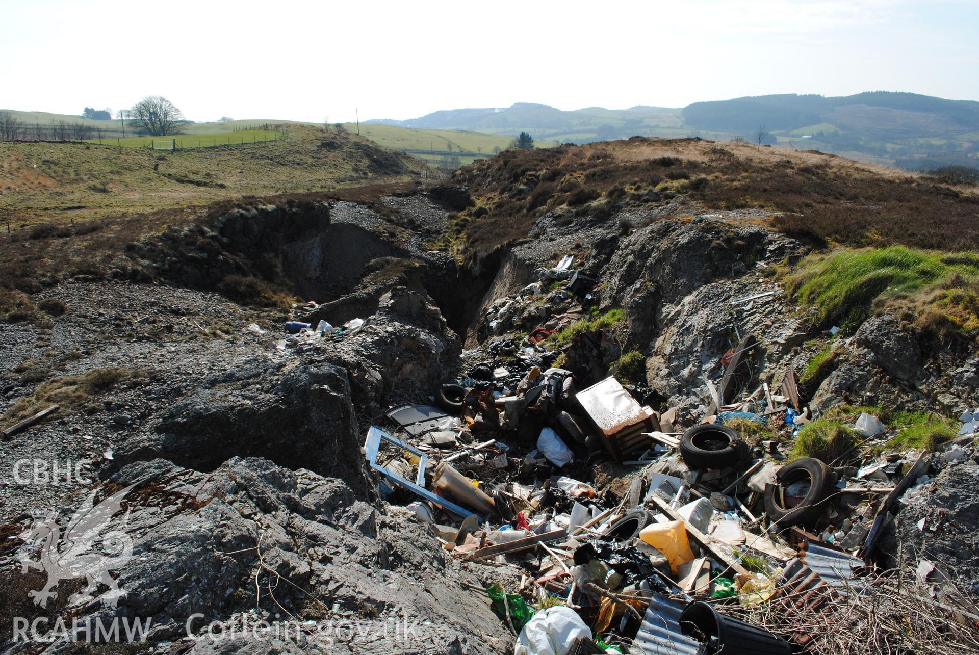 View of fly tipping in open cut