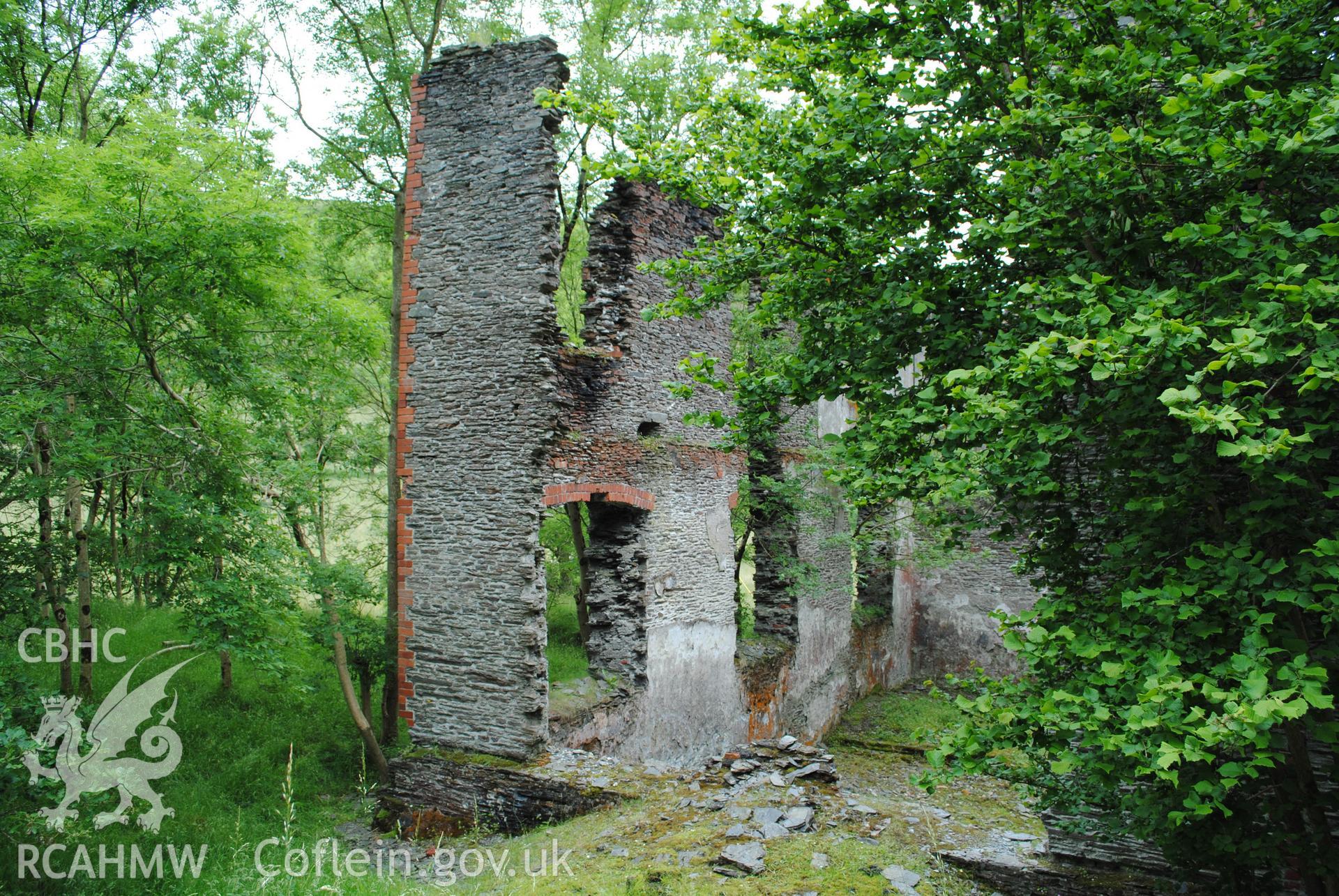 Exterior view of machine room from the east showing demolished wall through which machinery was removed