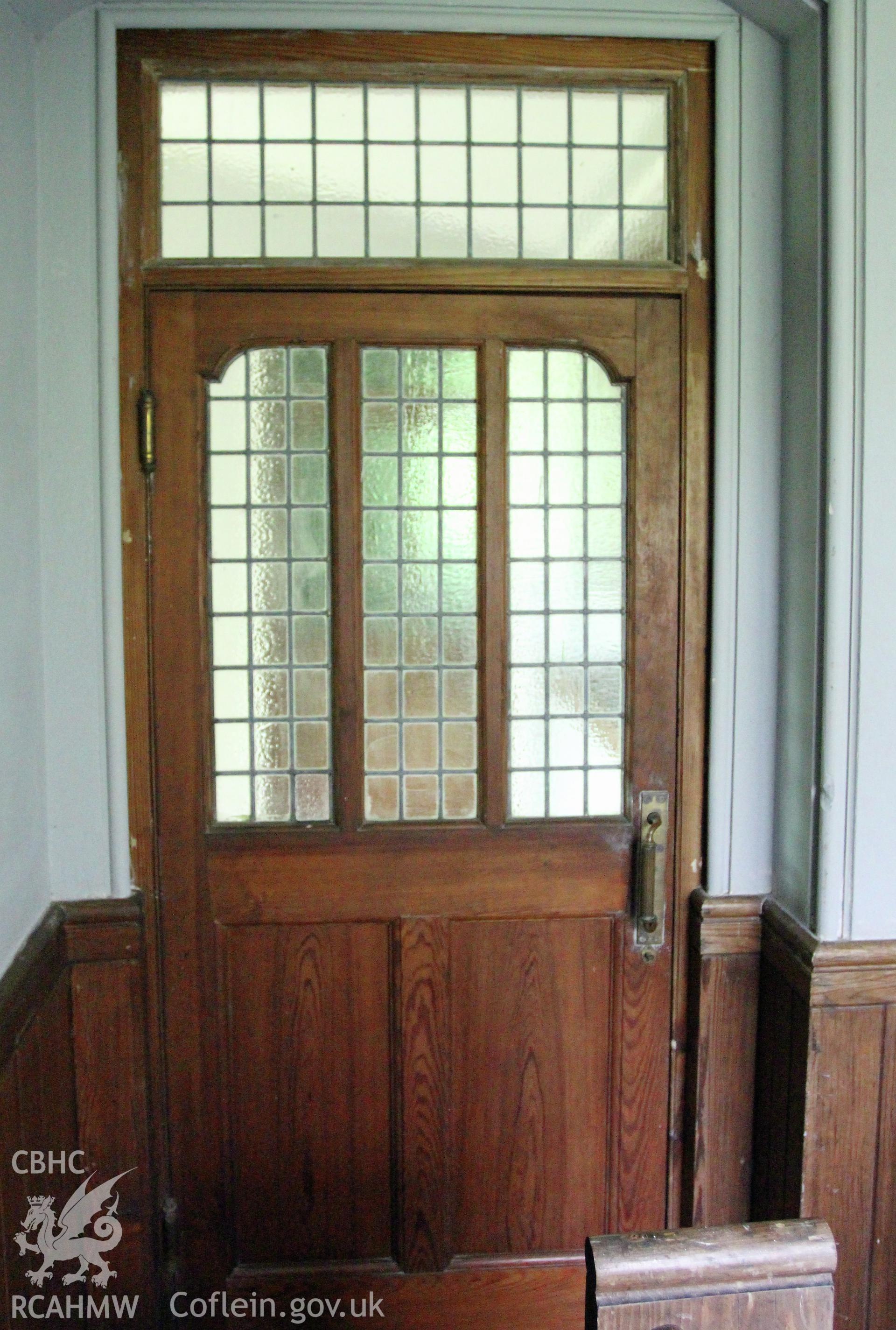 Detail of door to vestibule from main interior