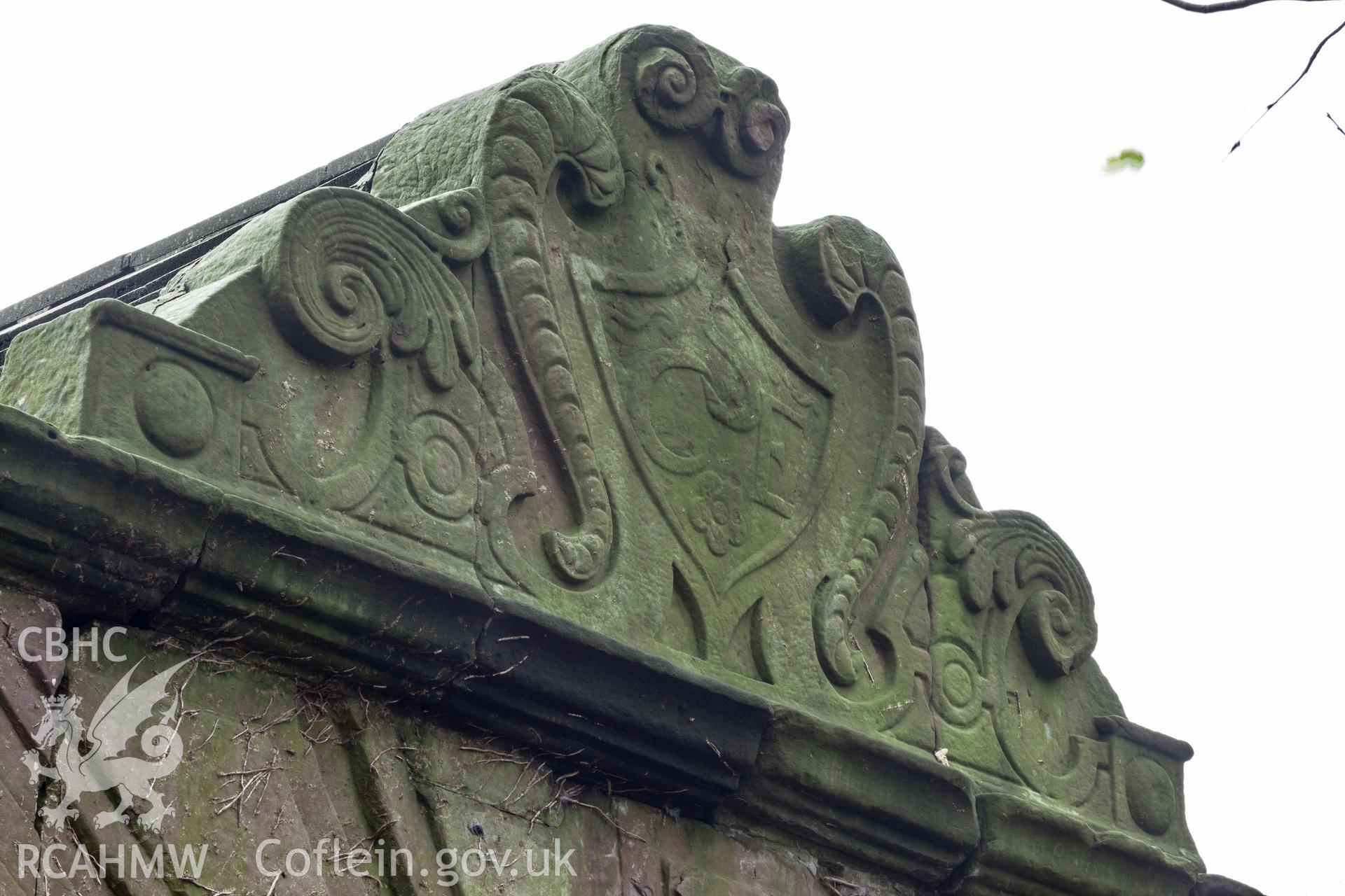 Carved pediment over gateway