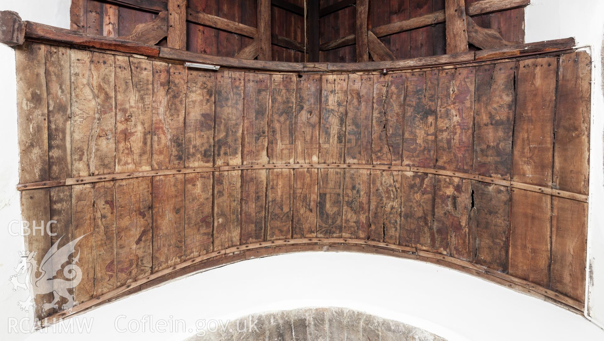 Painted barrel ceiling over altar.