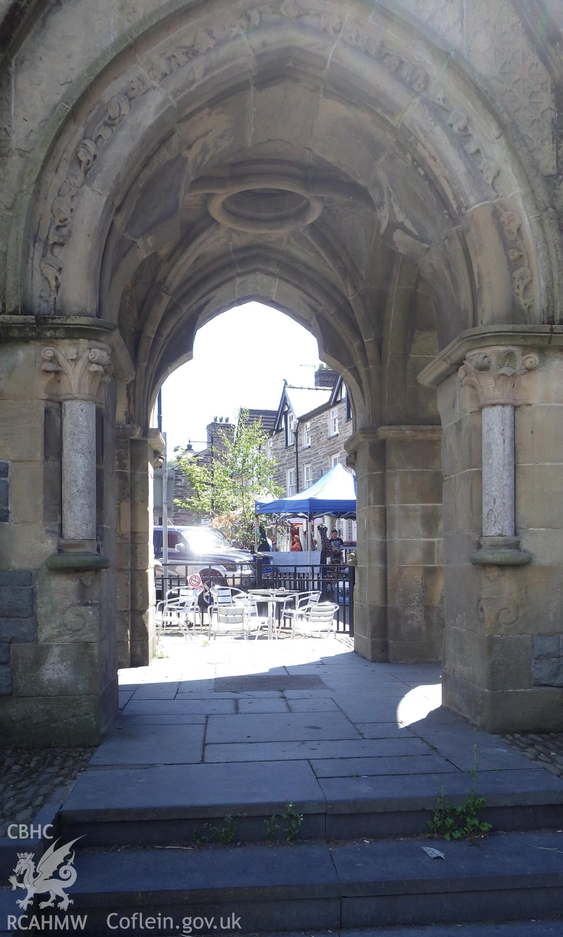 Steps leading to clocktower platform and barrelling of central arch (market day in Machynlleth in background)