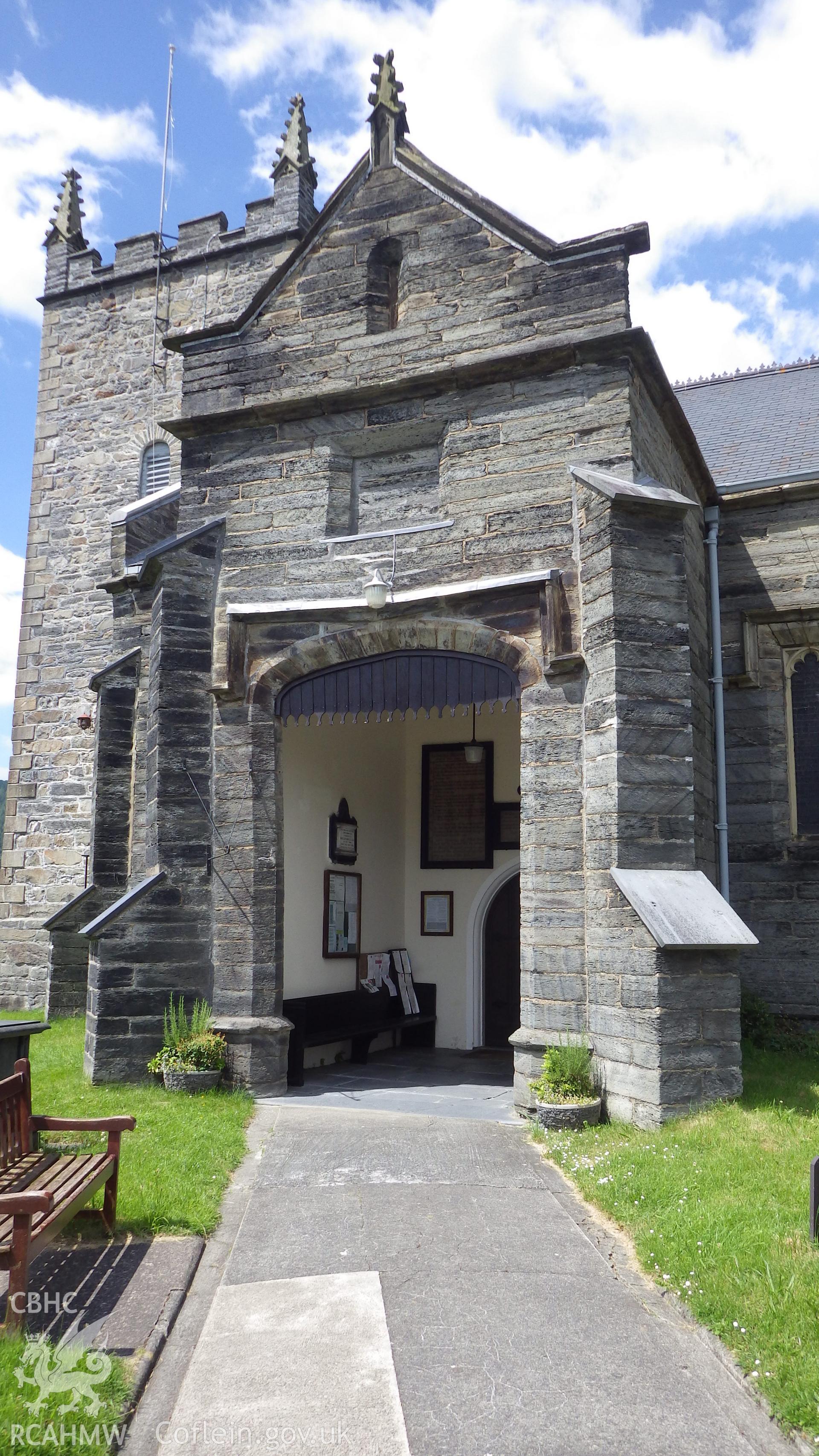 Entrance porch with the chruch's earlier-built tower to left of view