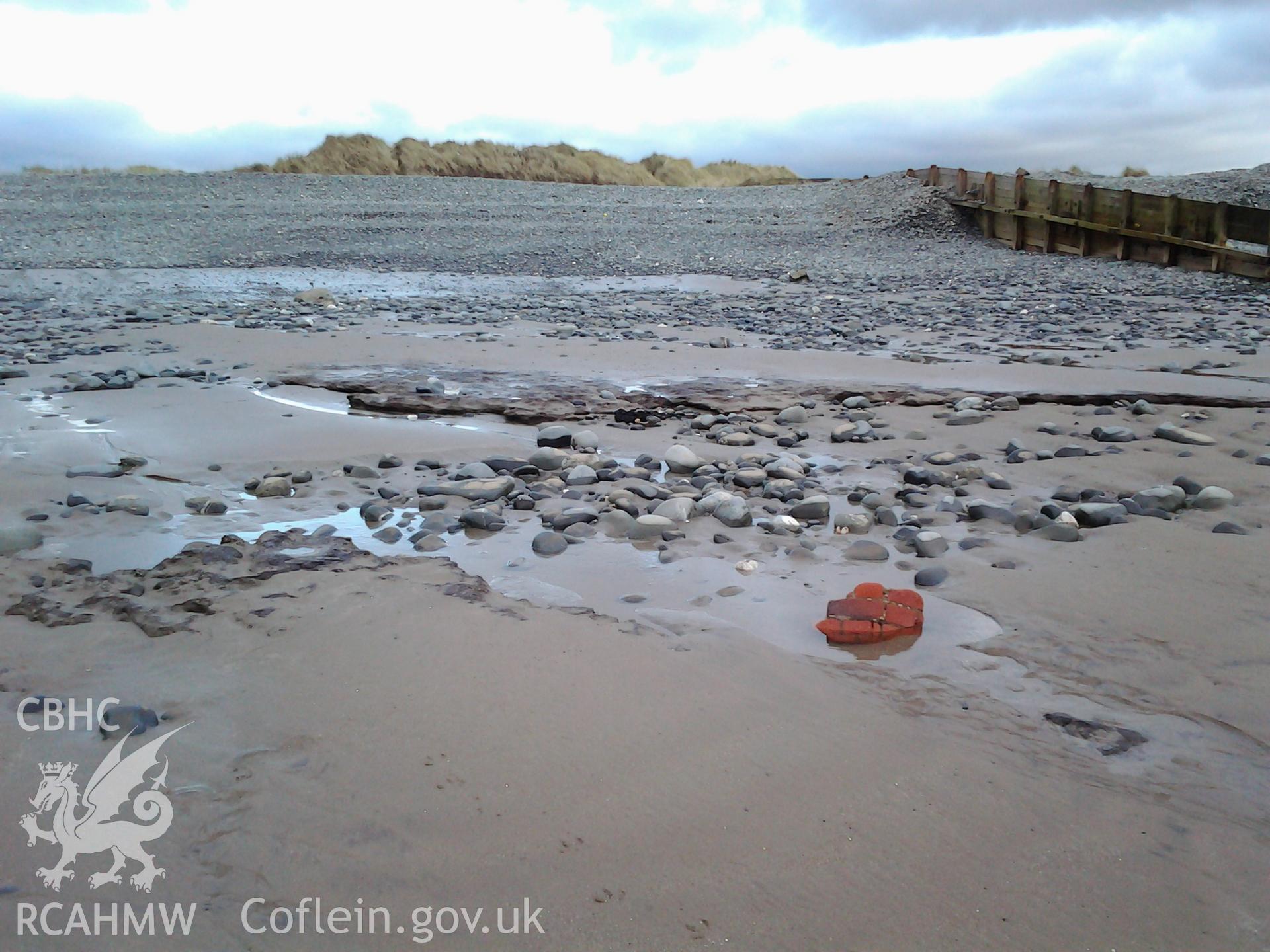 Fragment of brick walling, possibly from pillbox which once stood wihtin the dunes, just to the south of the groyne