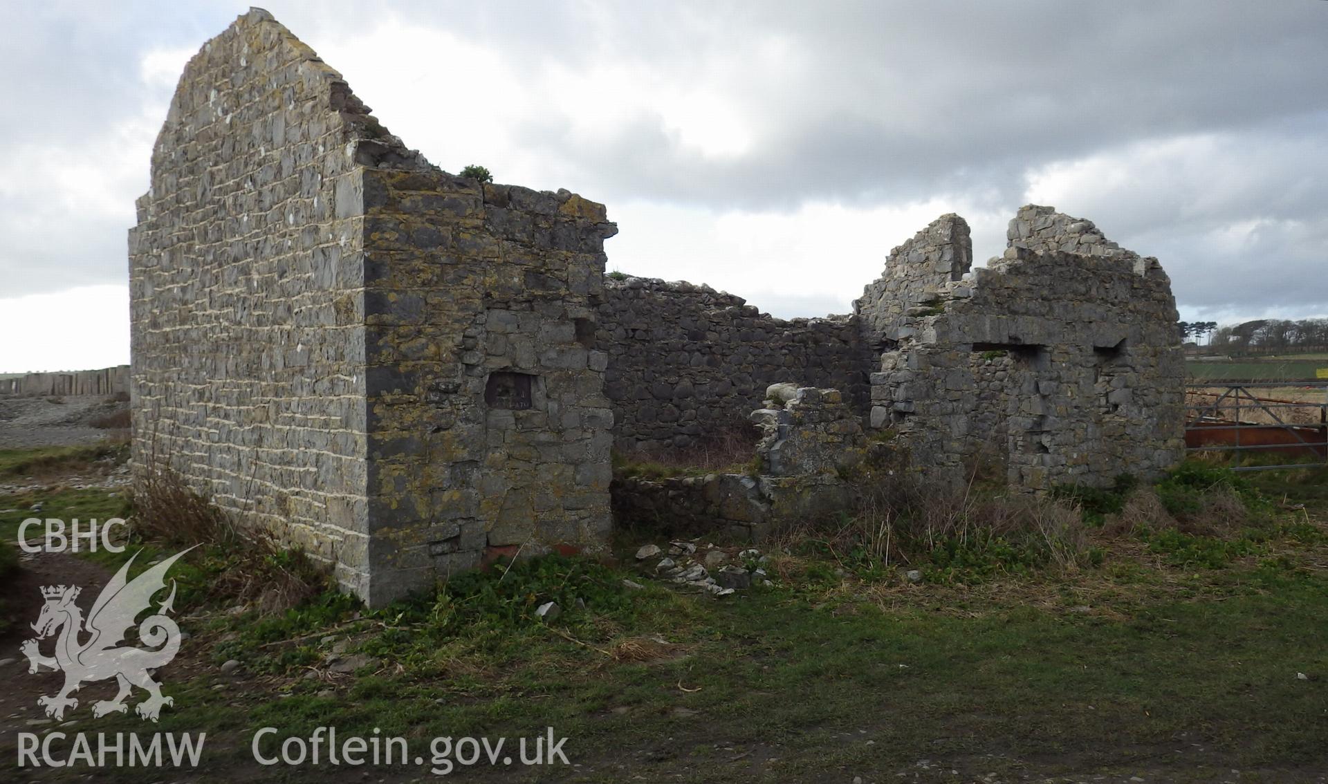 View of roofless building from southeast