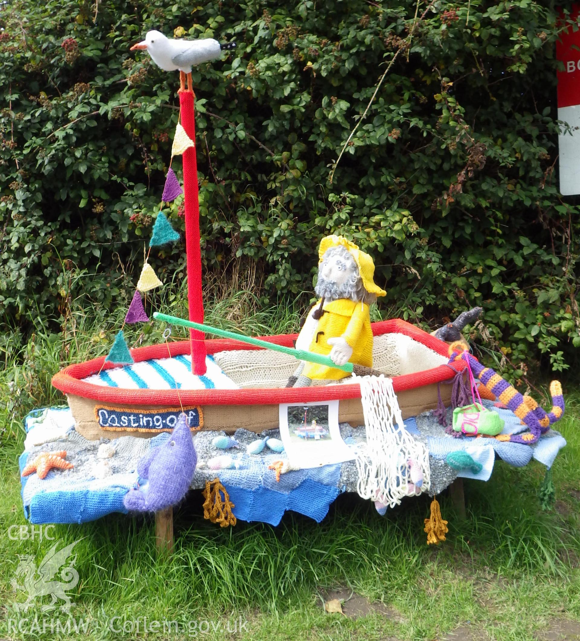 Sailing boat named 'Casting Off' placed near Llwyngwril station