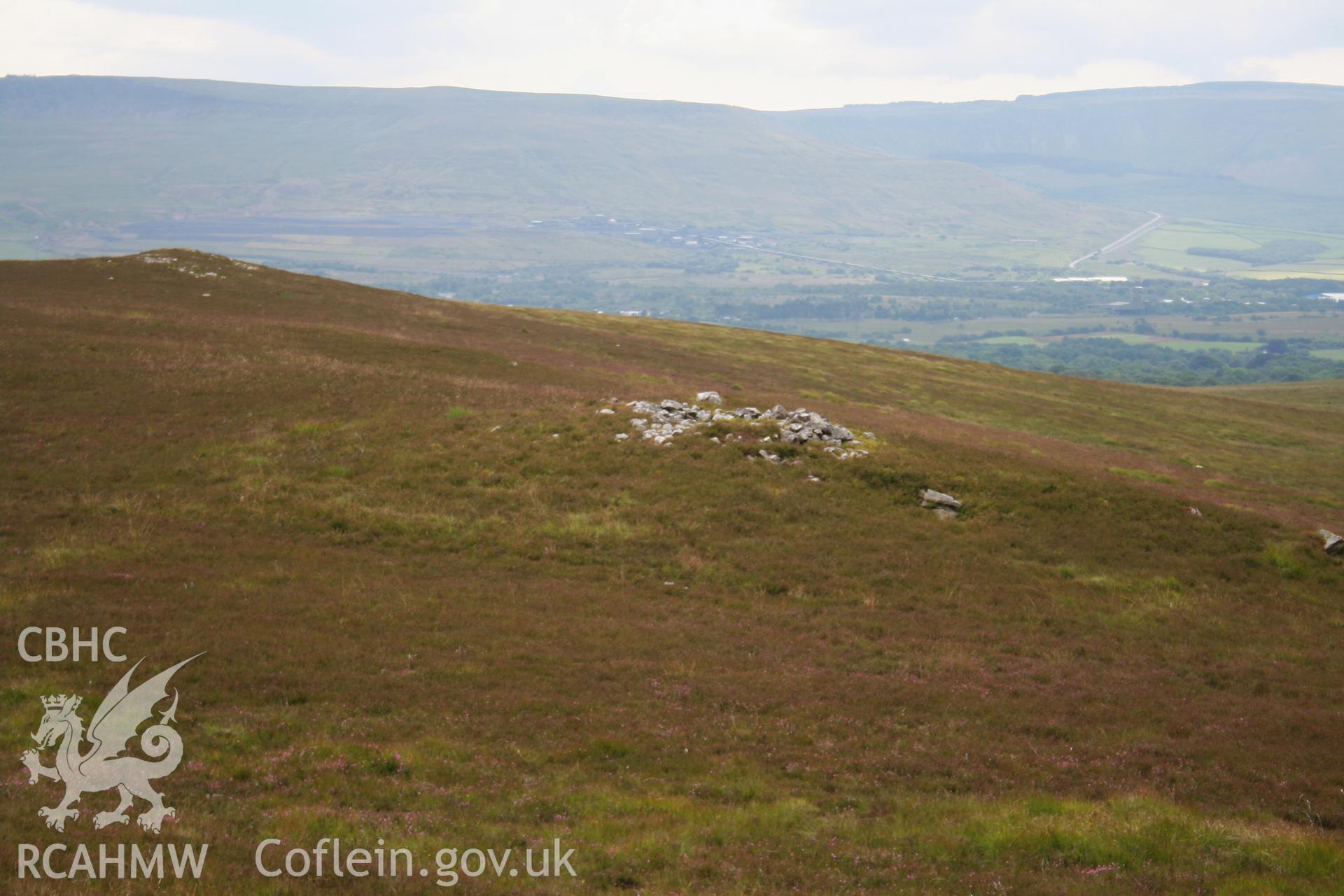 View of cairn from the north-east; 1m scale.