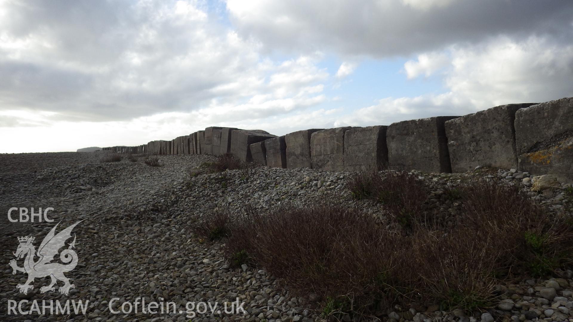 View of line of blocks sitting on shingle ridge (looking west)