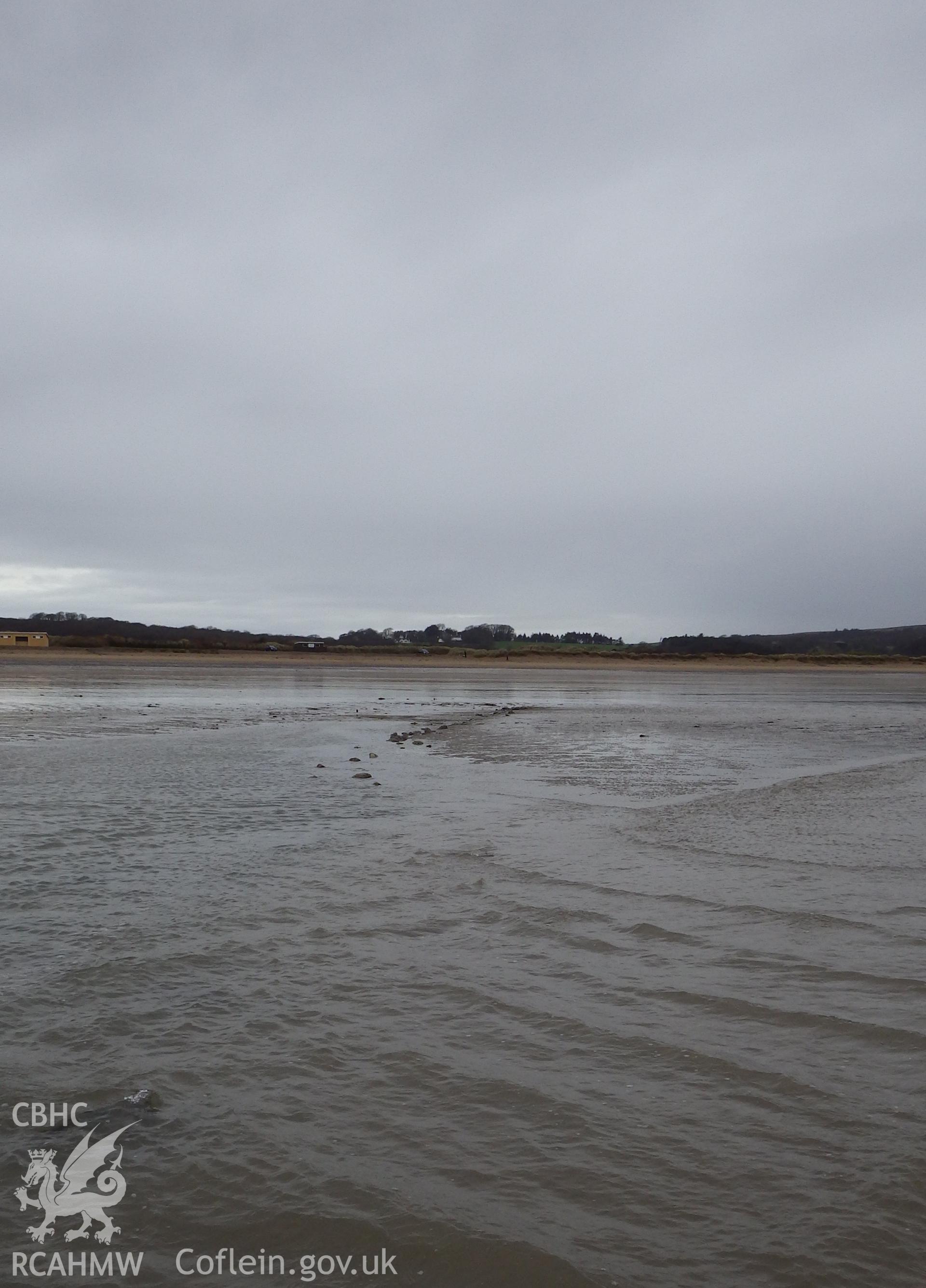 View along one arm of the fishtrap looking northwestward or towards the head of the beach