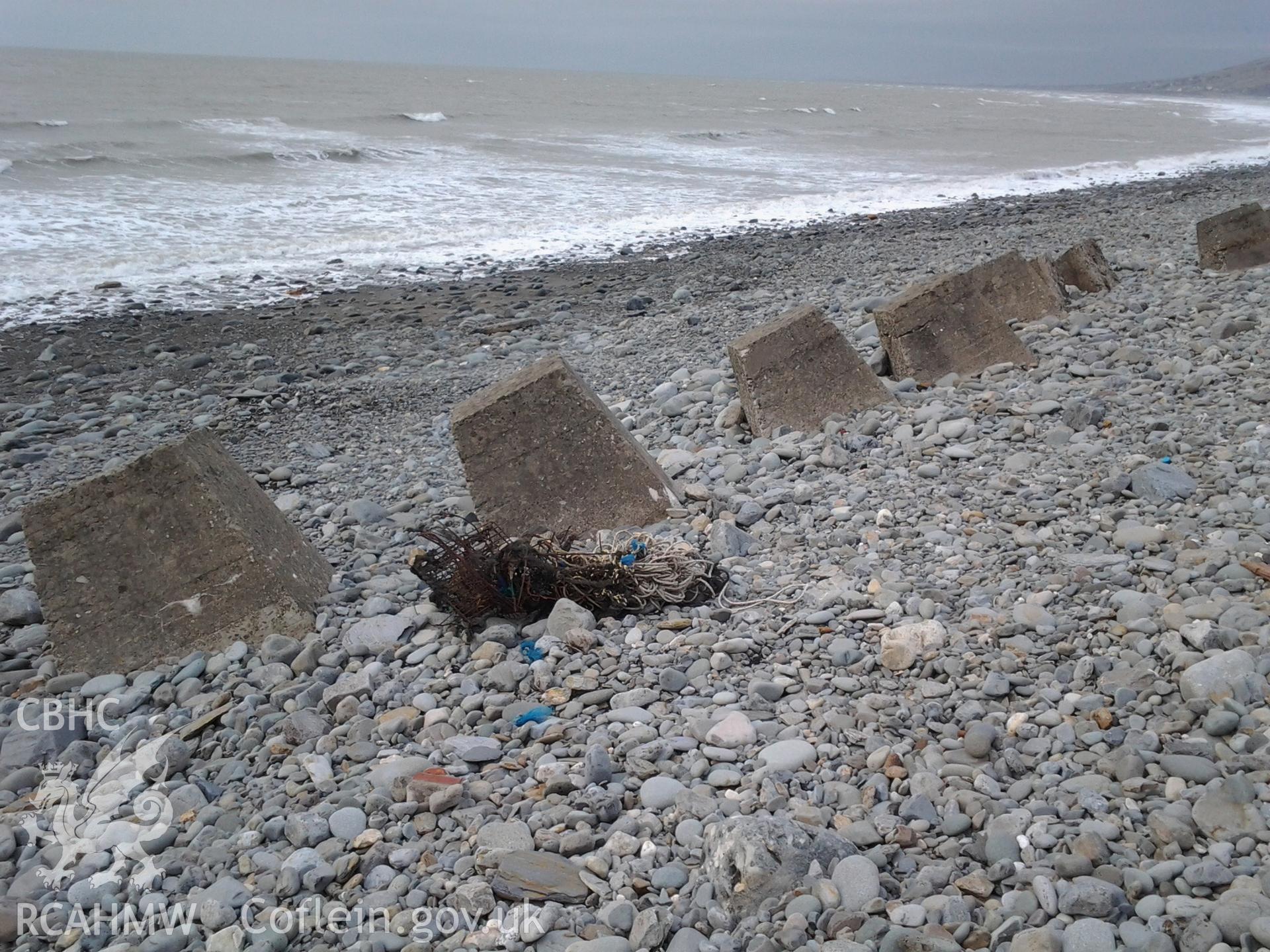 Slumping of the line during to changes in the profile of the shingle ridge in response to storm waves