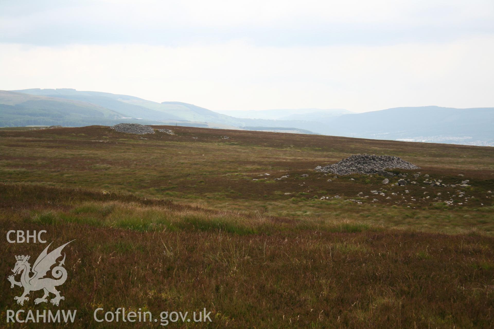 View of cairn (on the right) looking south-east towards cairn NPRN 84501.