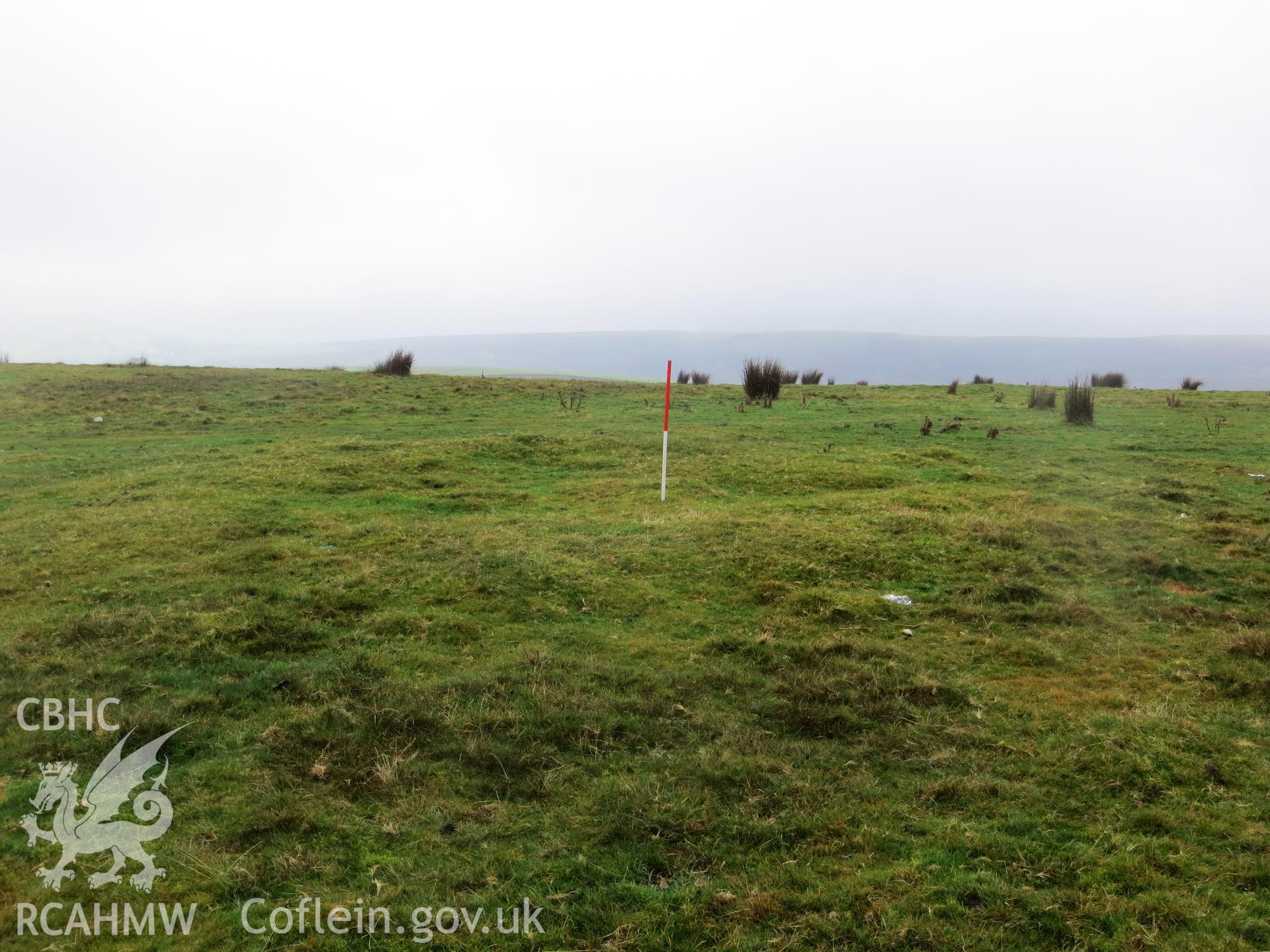 View from the east; 1m scale at centre.