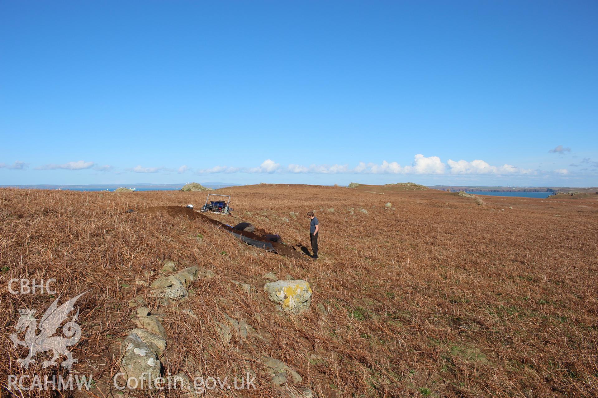 Skomer Island, excavation of a prehistoric lynchet associated with the North Stream Settlement 2016, evening view from west