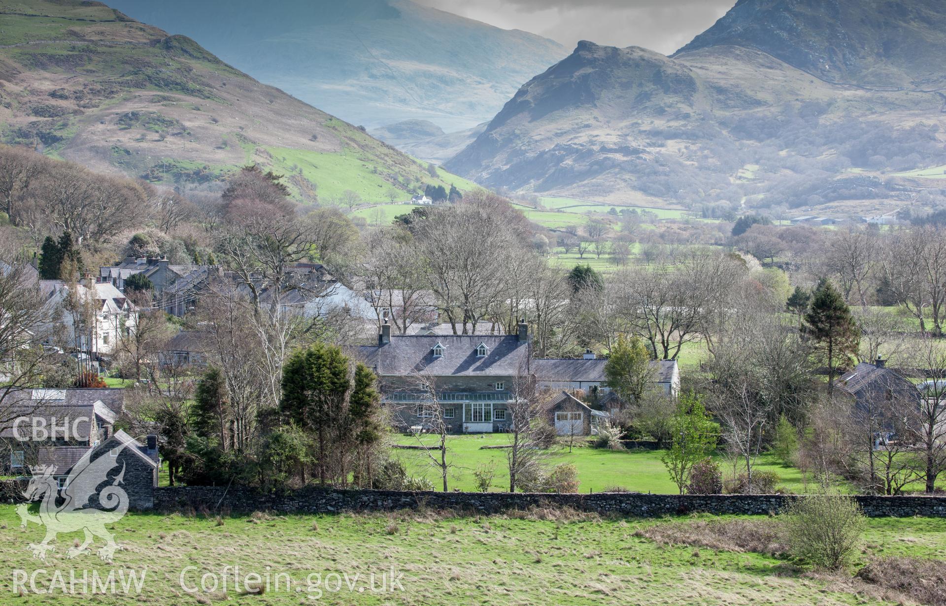 Distant view of Ty Mawr in landscape setting from the west