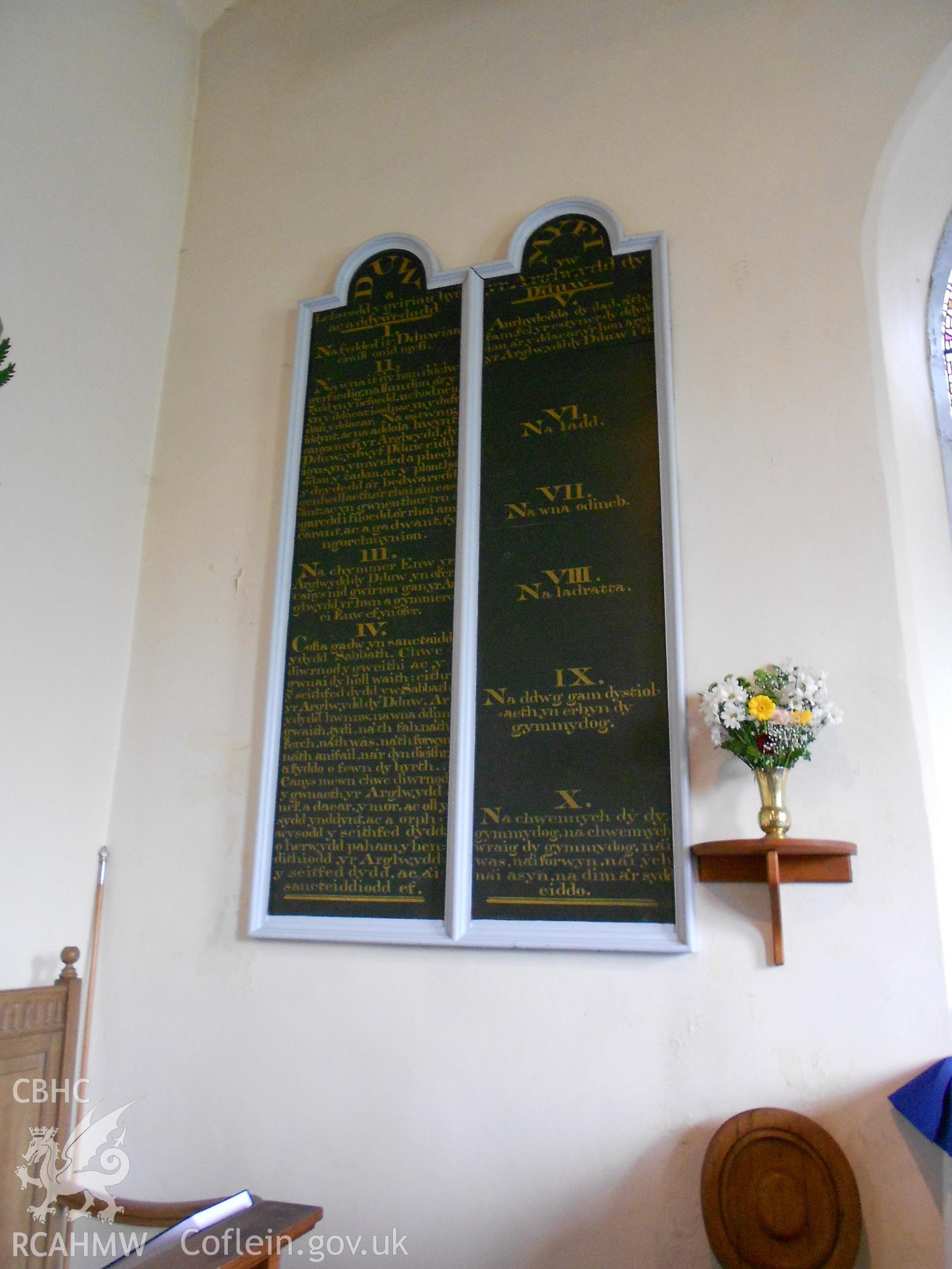 Board to left of altar showing ten commandments in Welsh