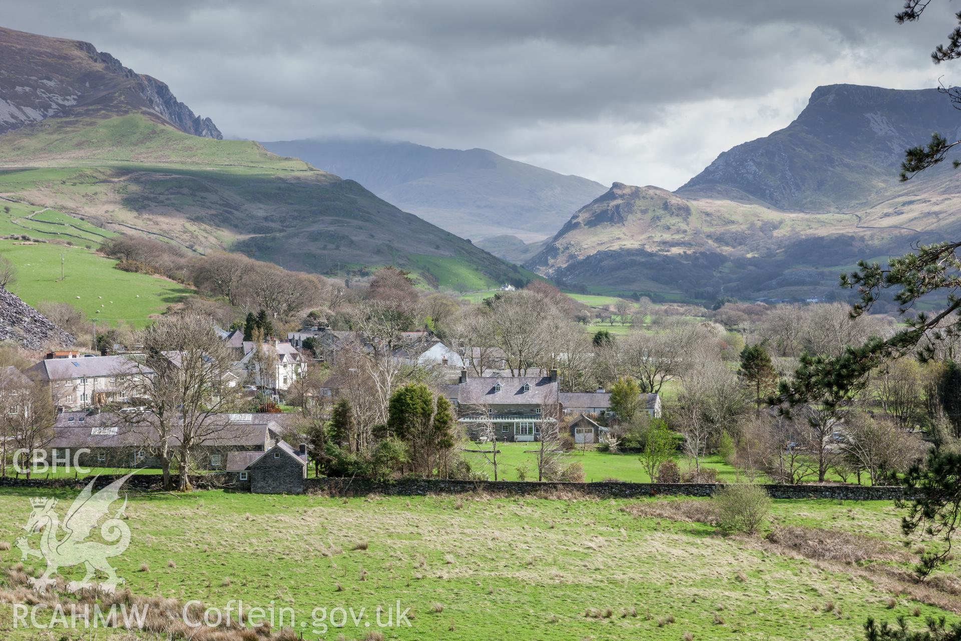 Distant view of Ty Mawr in landscape setting from the west