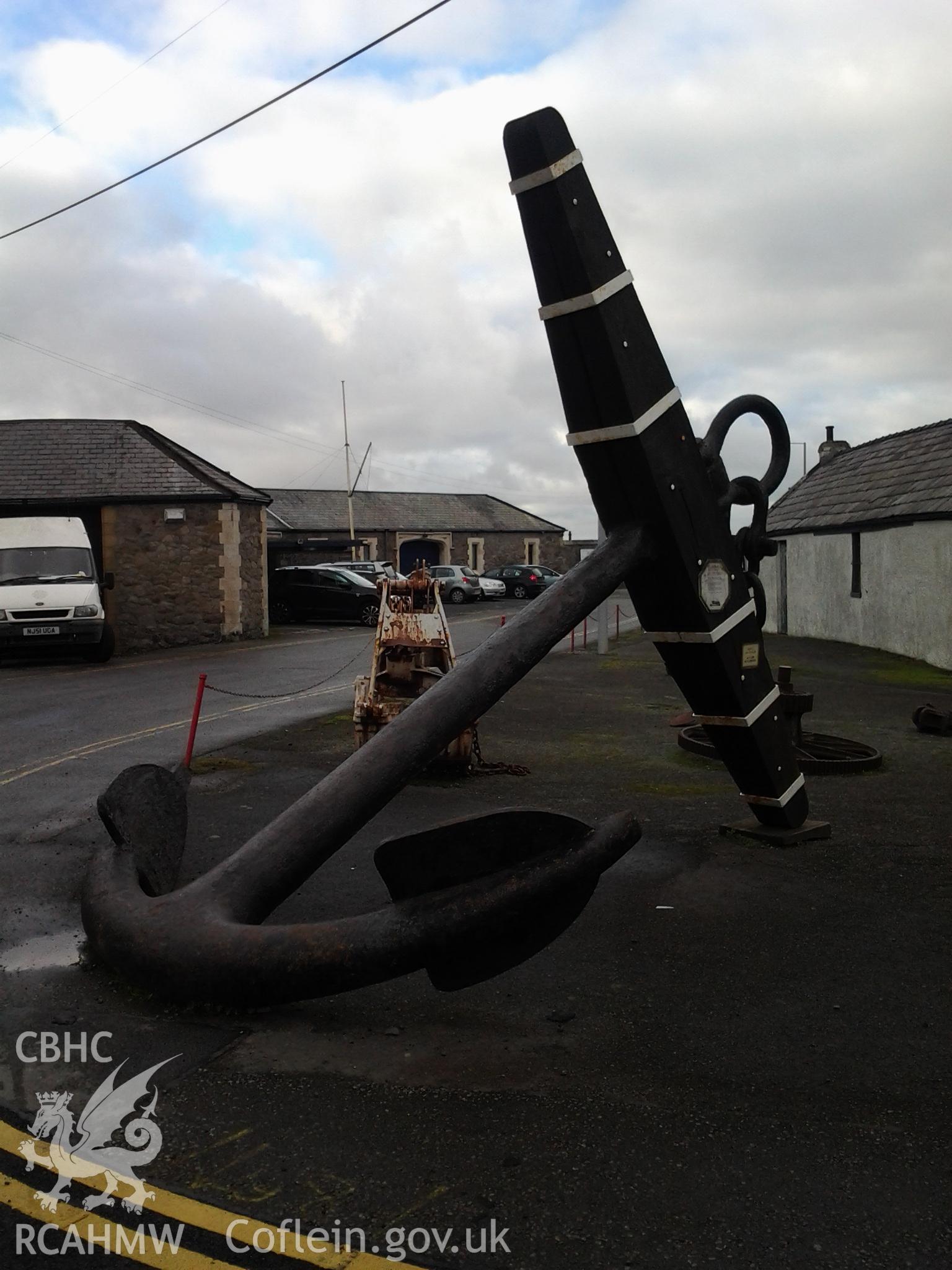 Anchor with former museum building in background to the right