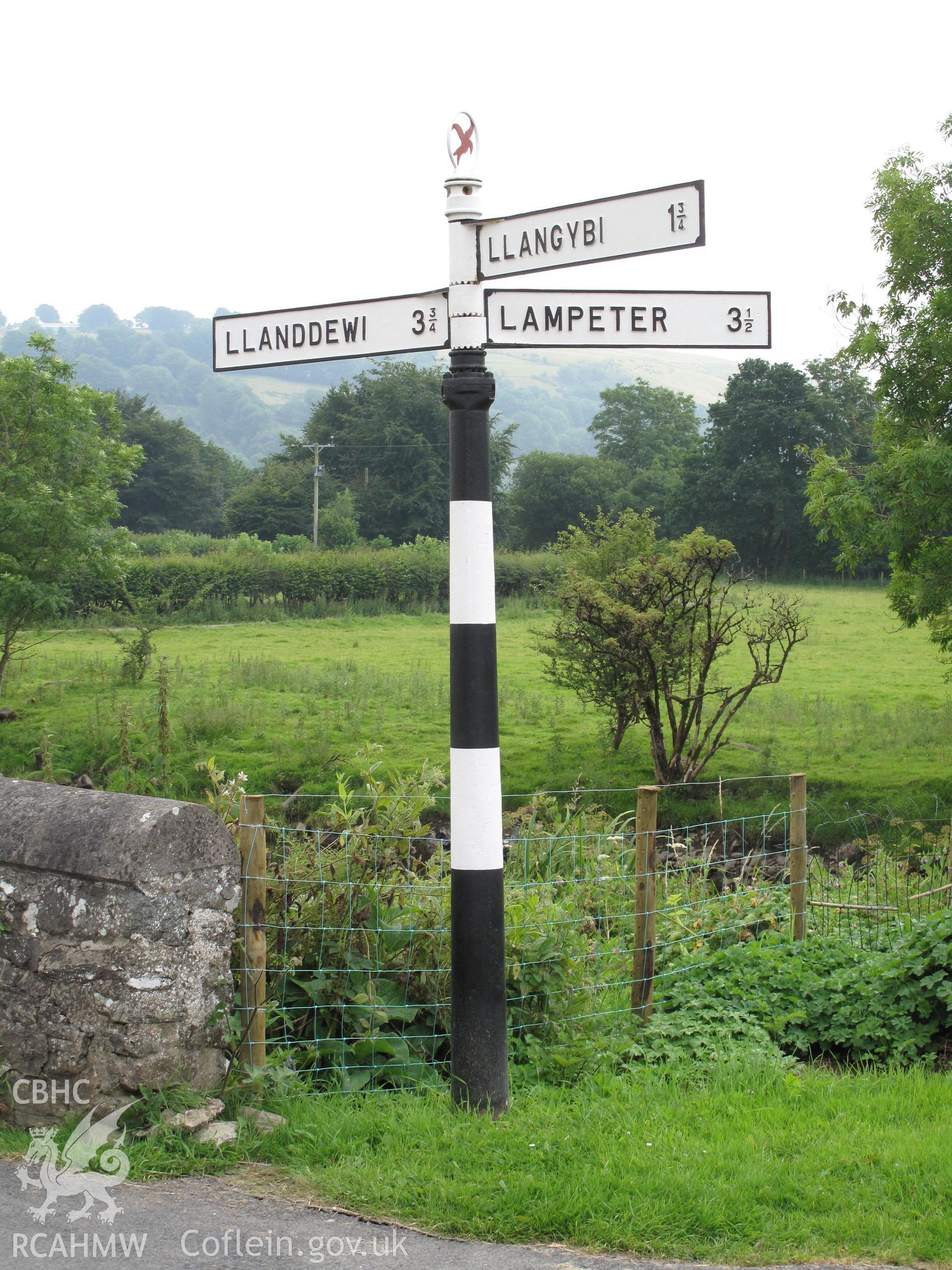 Signpost by the bridge at Llanfair Clydogau.