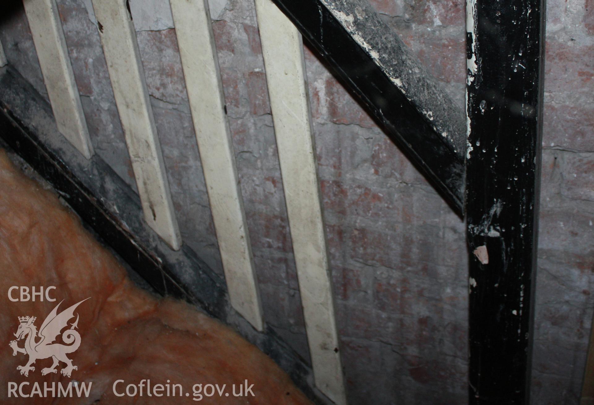 Stair in former cow-housestable, against the front wall.