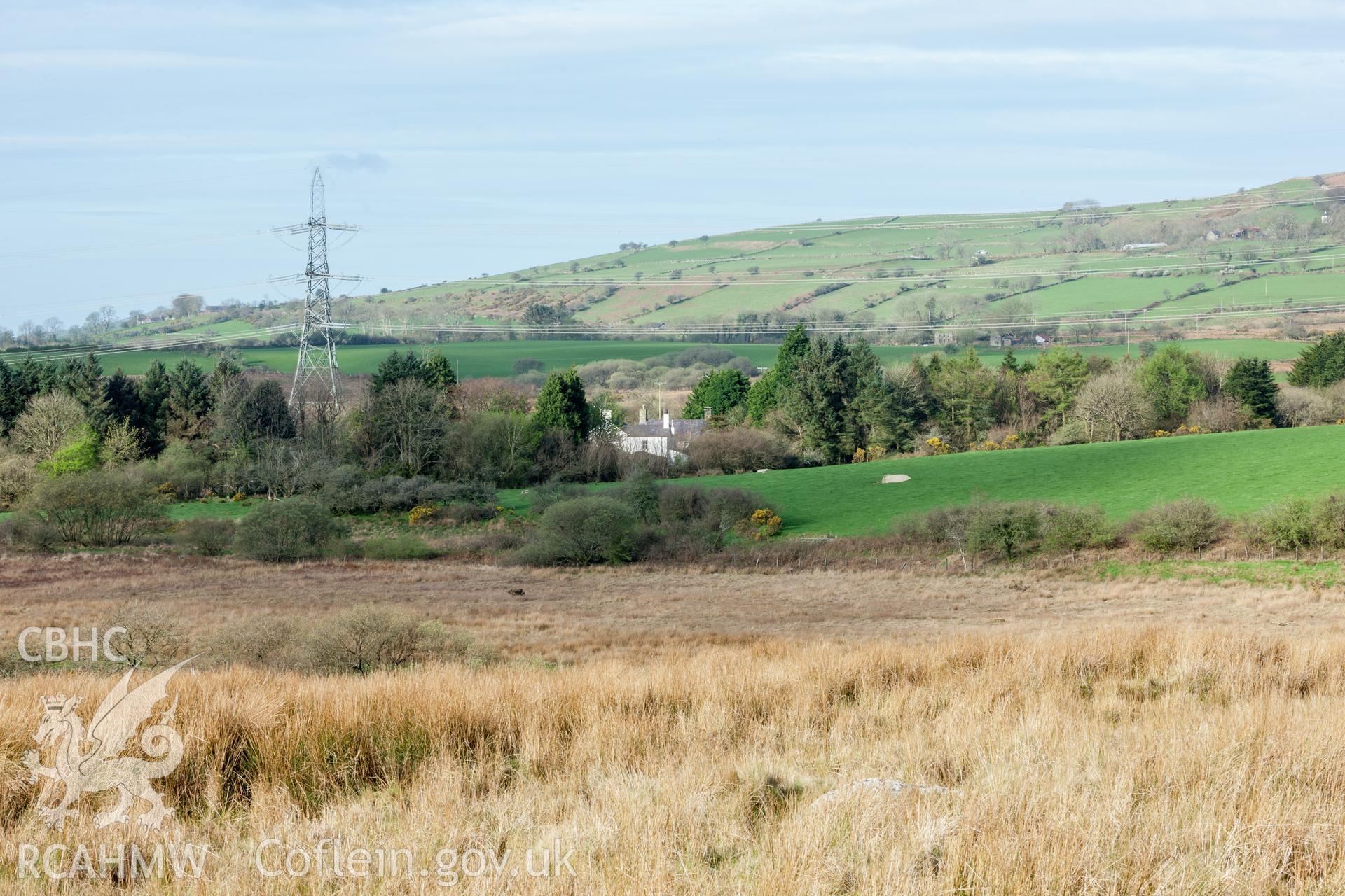 Distant view of Derwyn-bach in its landscape setting from the northeast