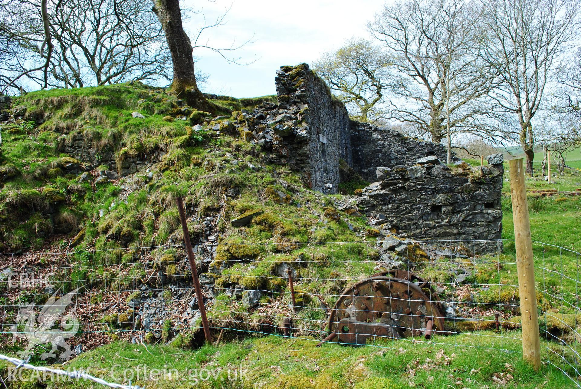 View of waterwheel with associated building