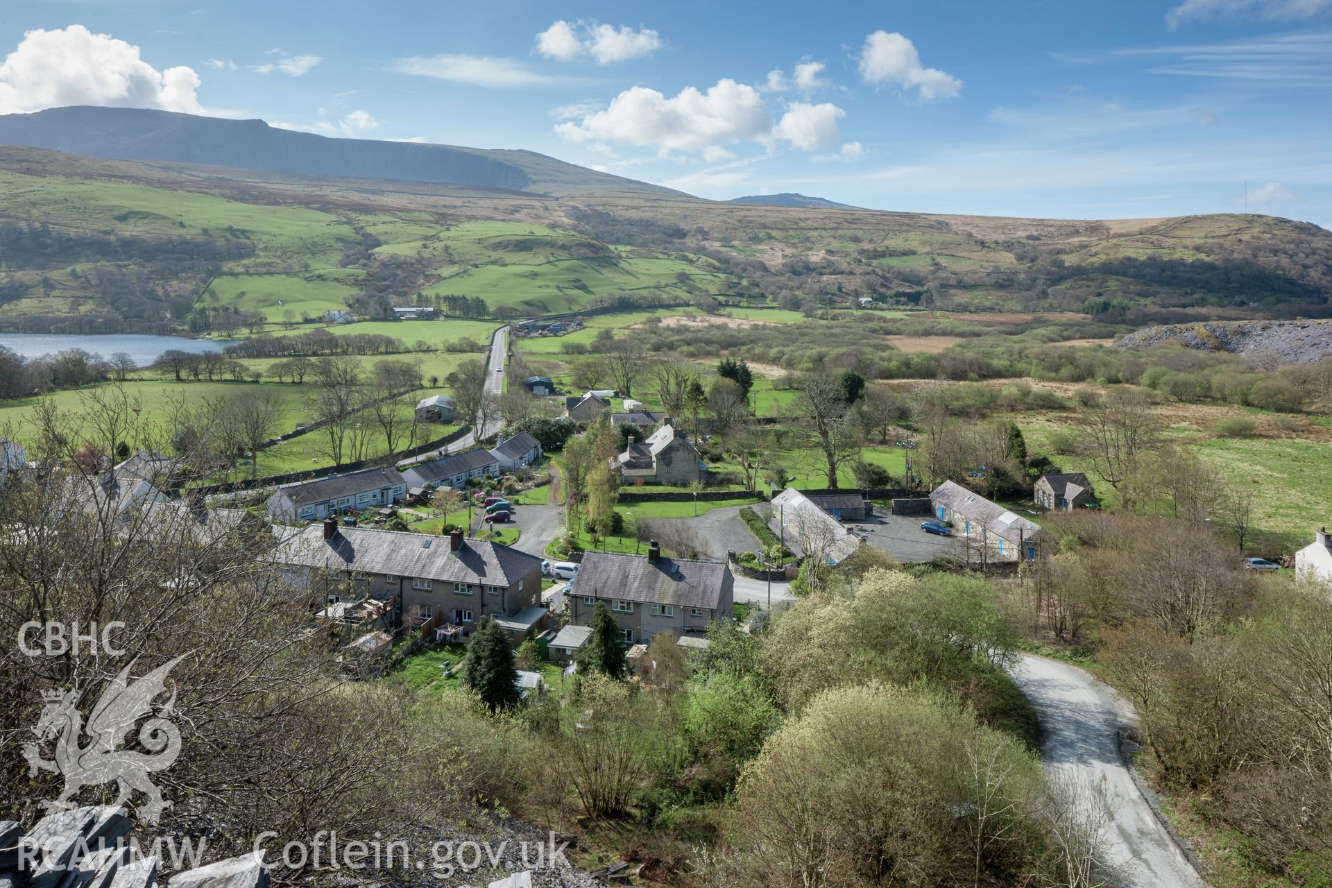 Distant view of Ty Mawr in landscape setting from the north northeast