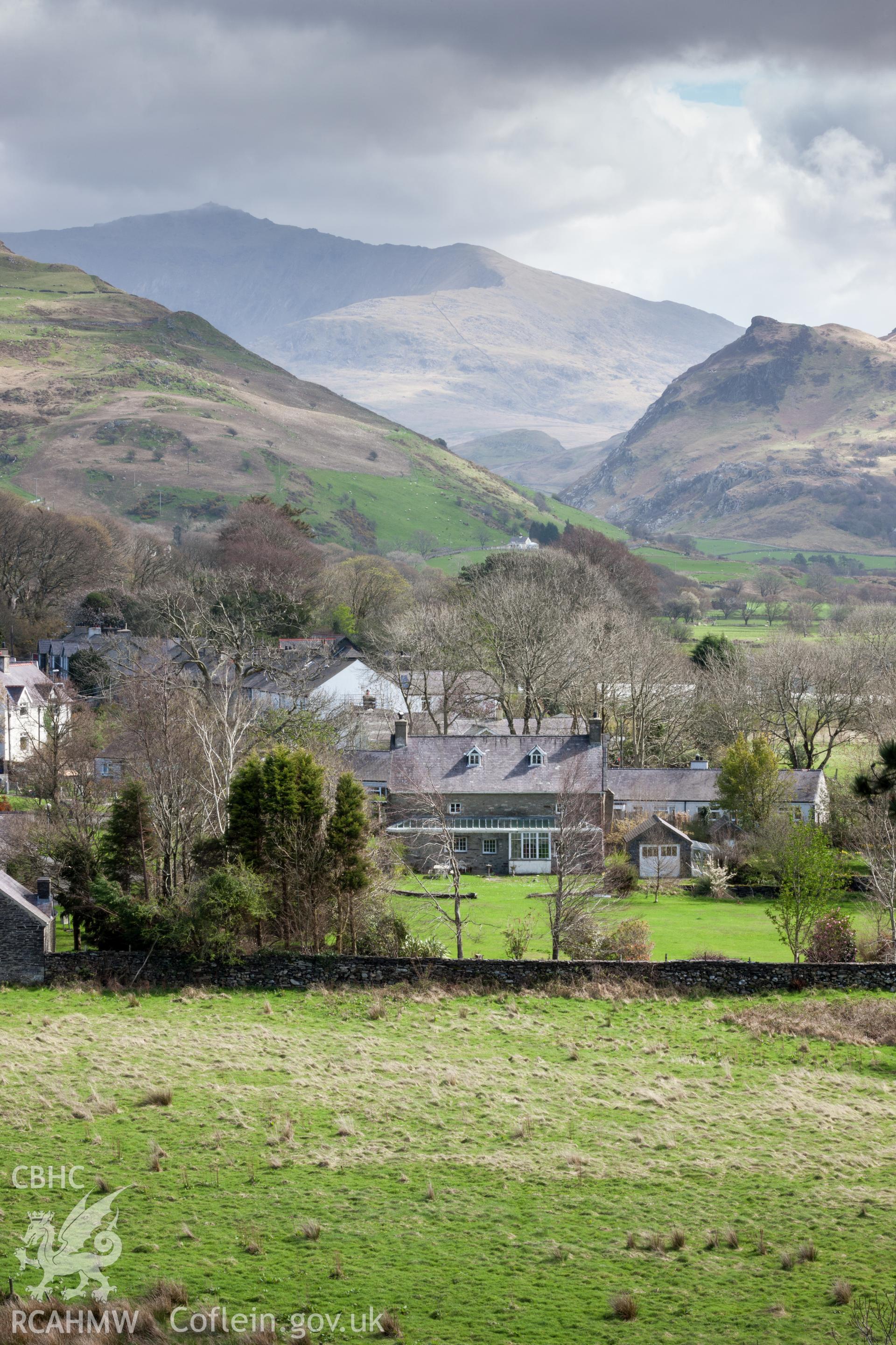 Distant view of Ty Mawr in landscape setting from the west