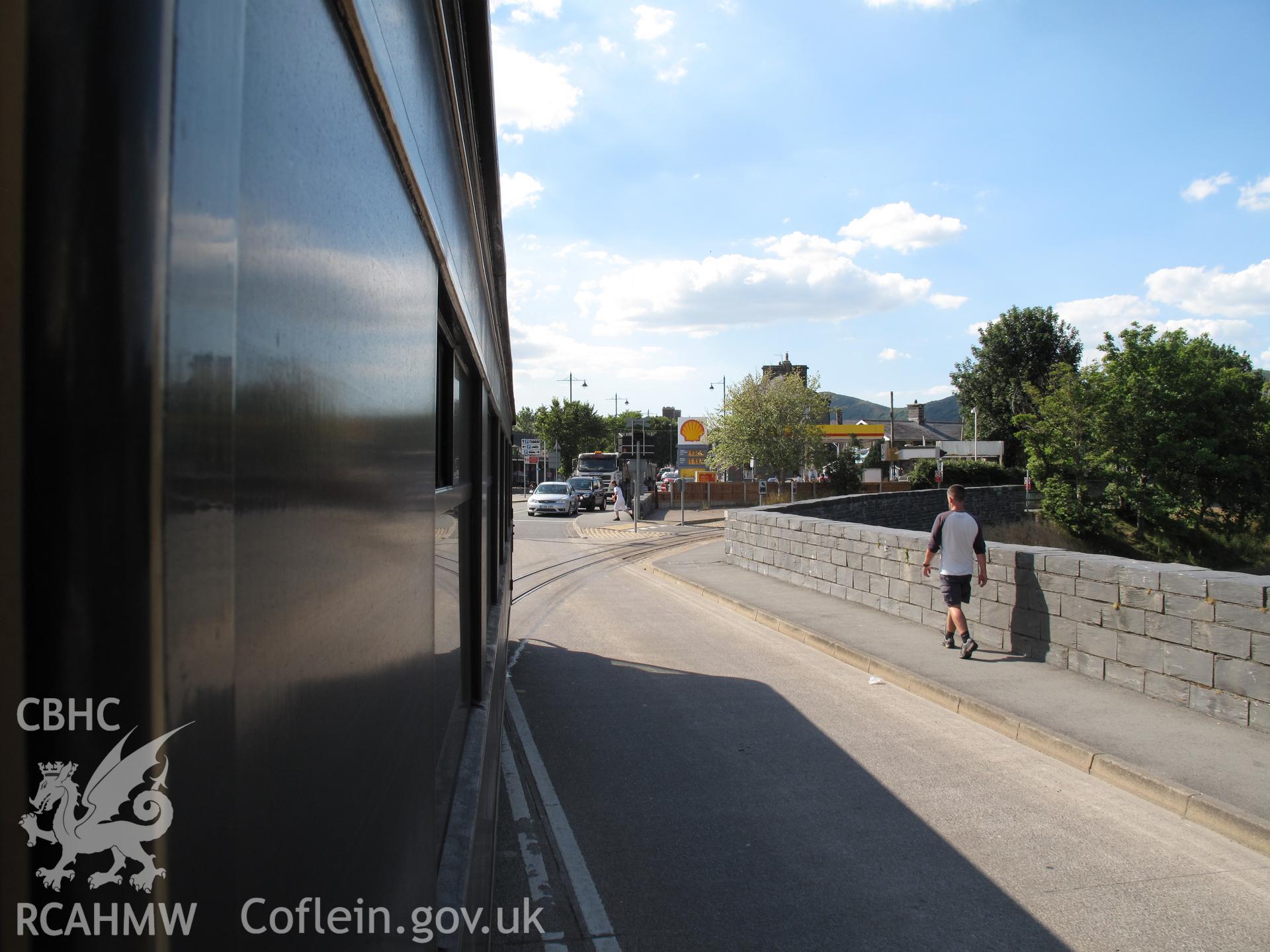 Welsh Highland Railway train crossing Britannia Bridge, Porthmadog.