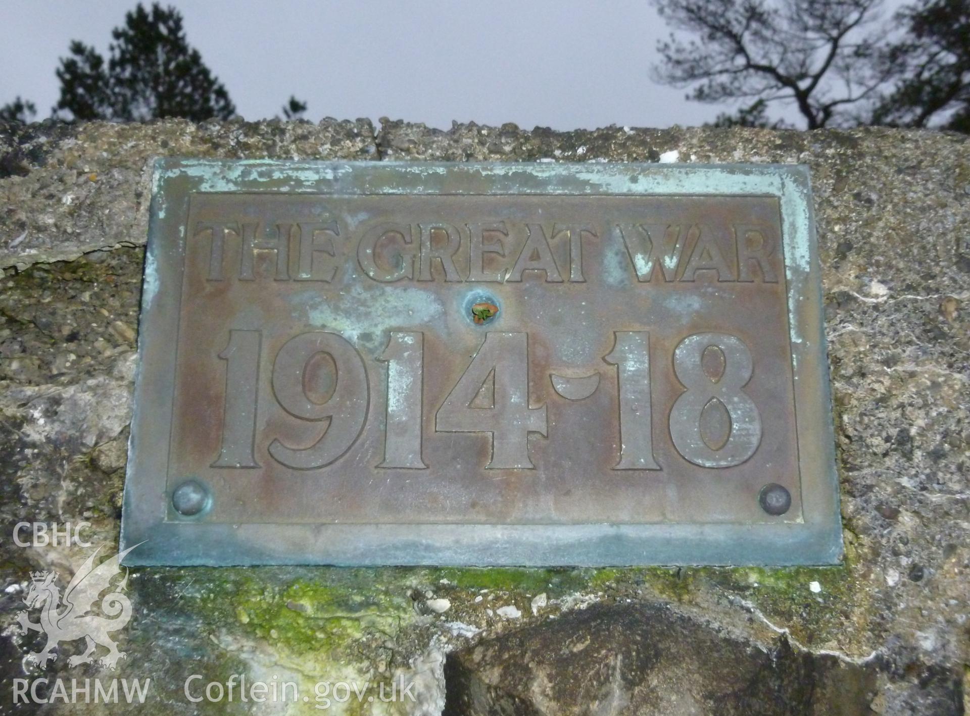 Plaque at the centre of the lintel forming the arch identifying the Great War