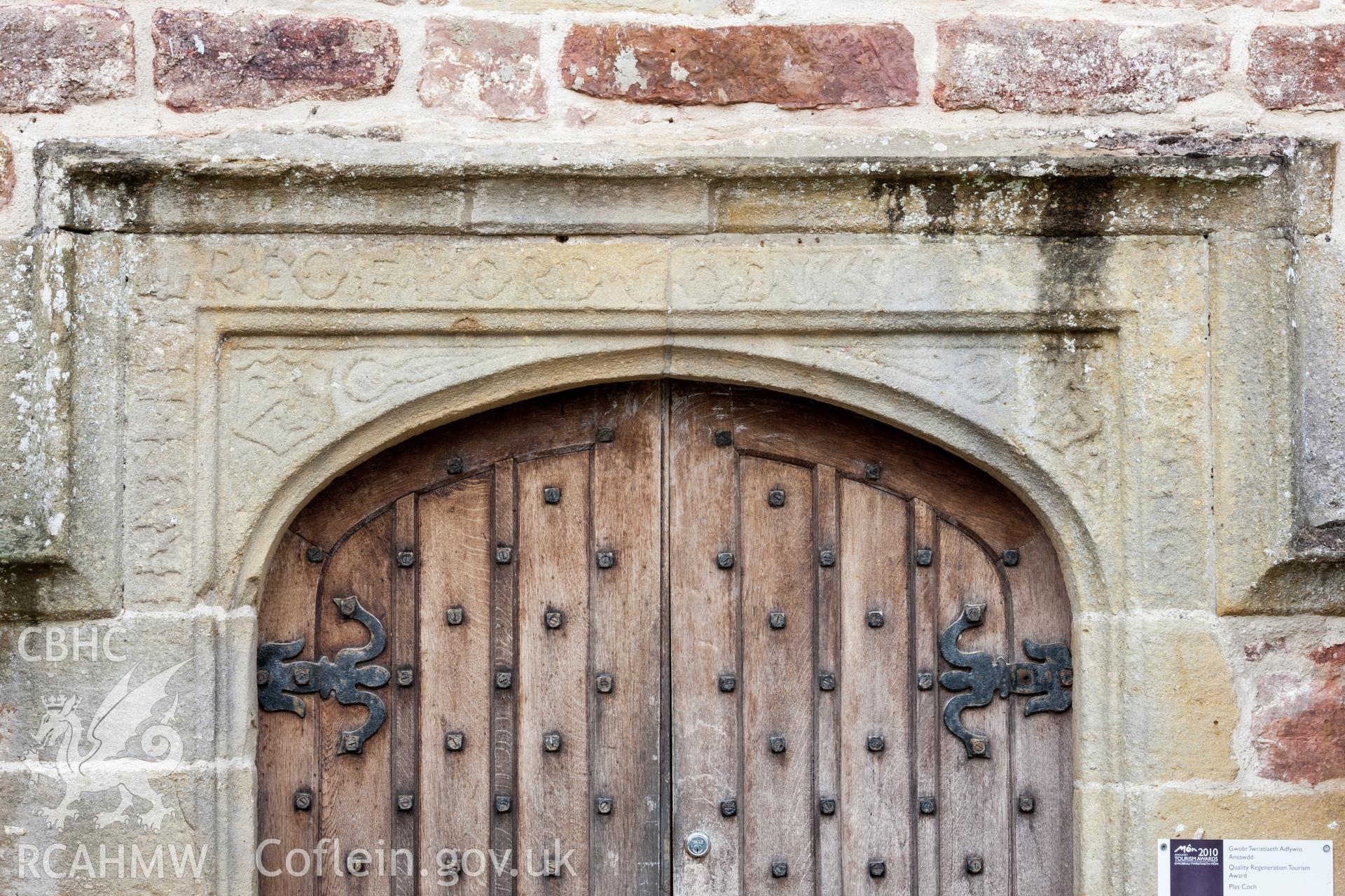 Detail of inscription over door, available light