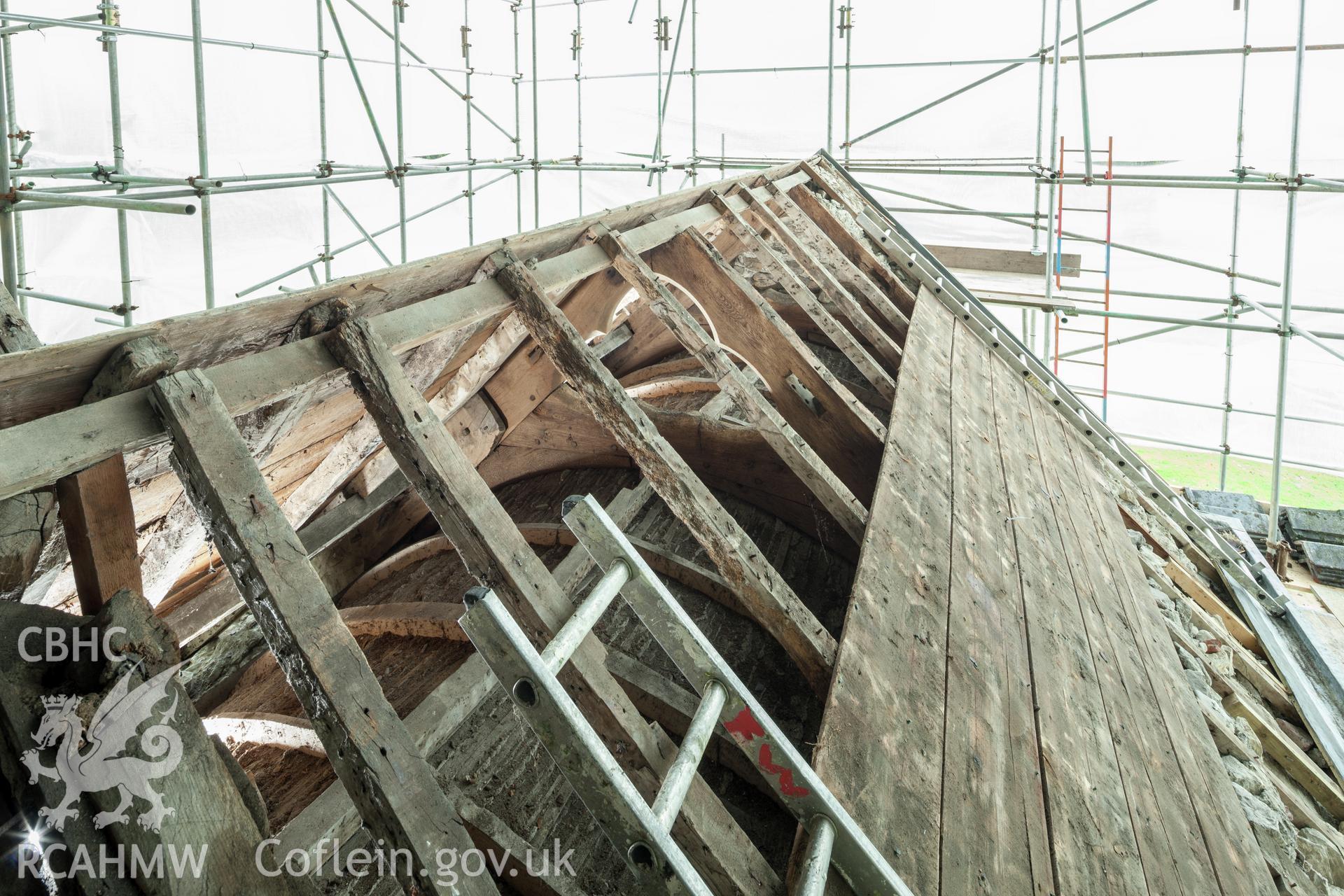 View of chapel roof, slate and boarduing removed to show frame