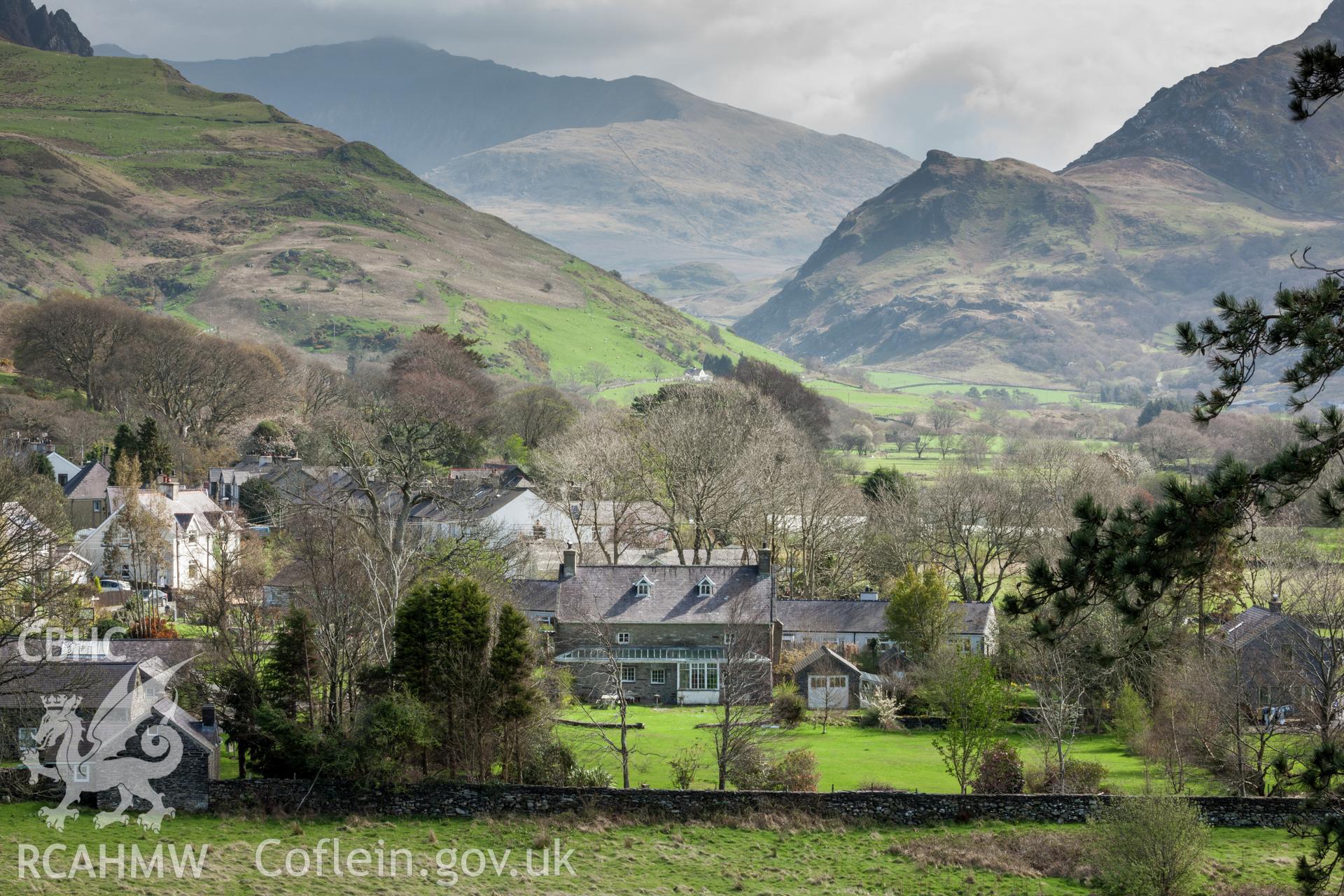 Distant view of Ty Mawr in landscape setting from the west