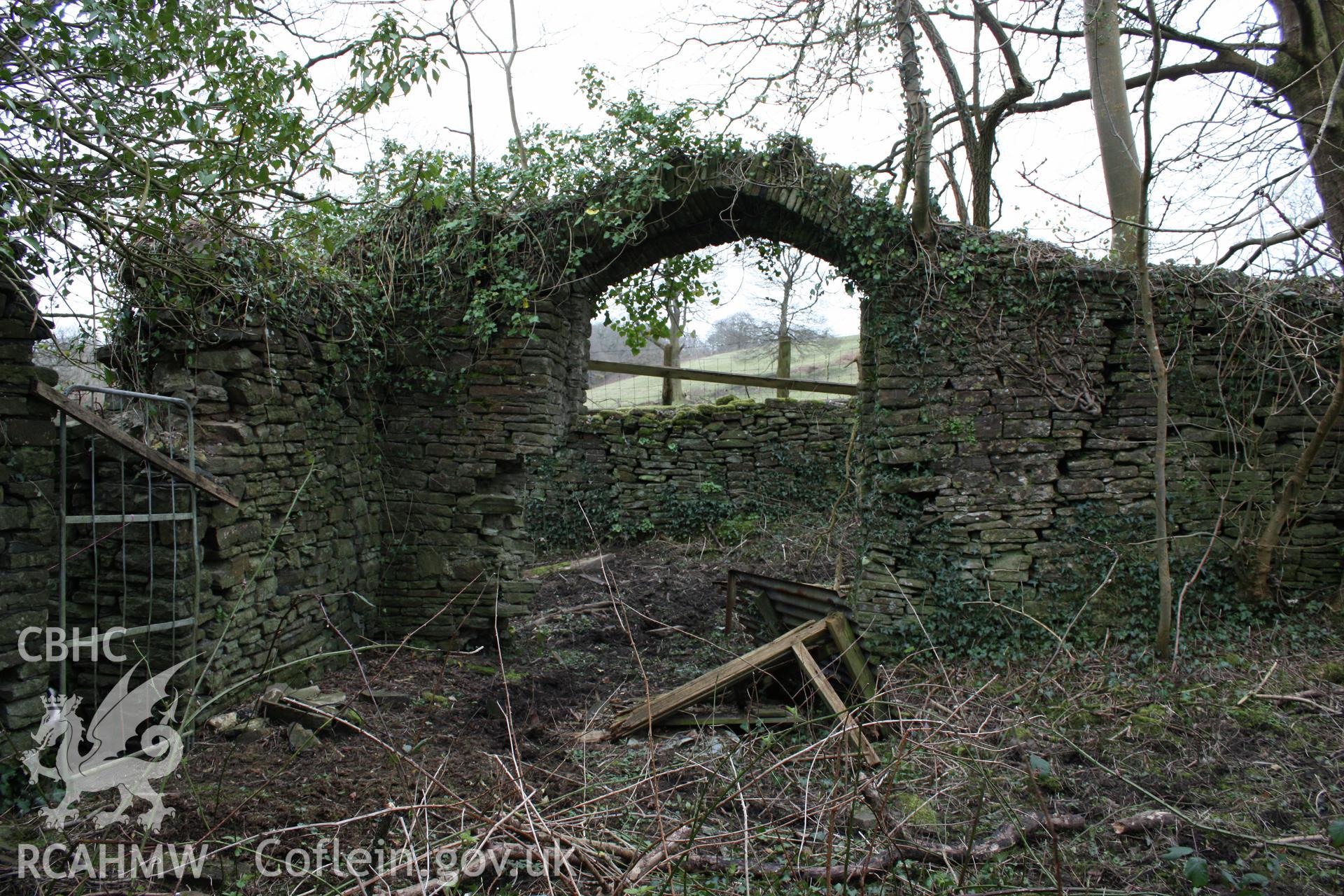 Plas y Bettws, Bridgend. Arch leading out of manor house courtyard.