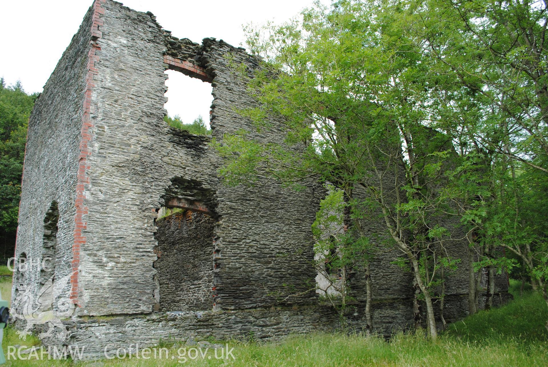 Exterior view of machine room and attached store from the south.