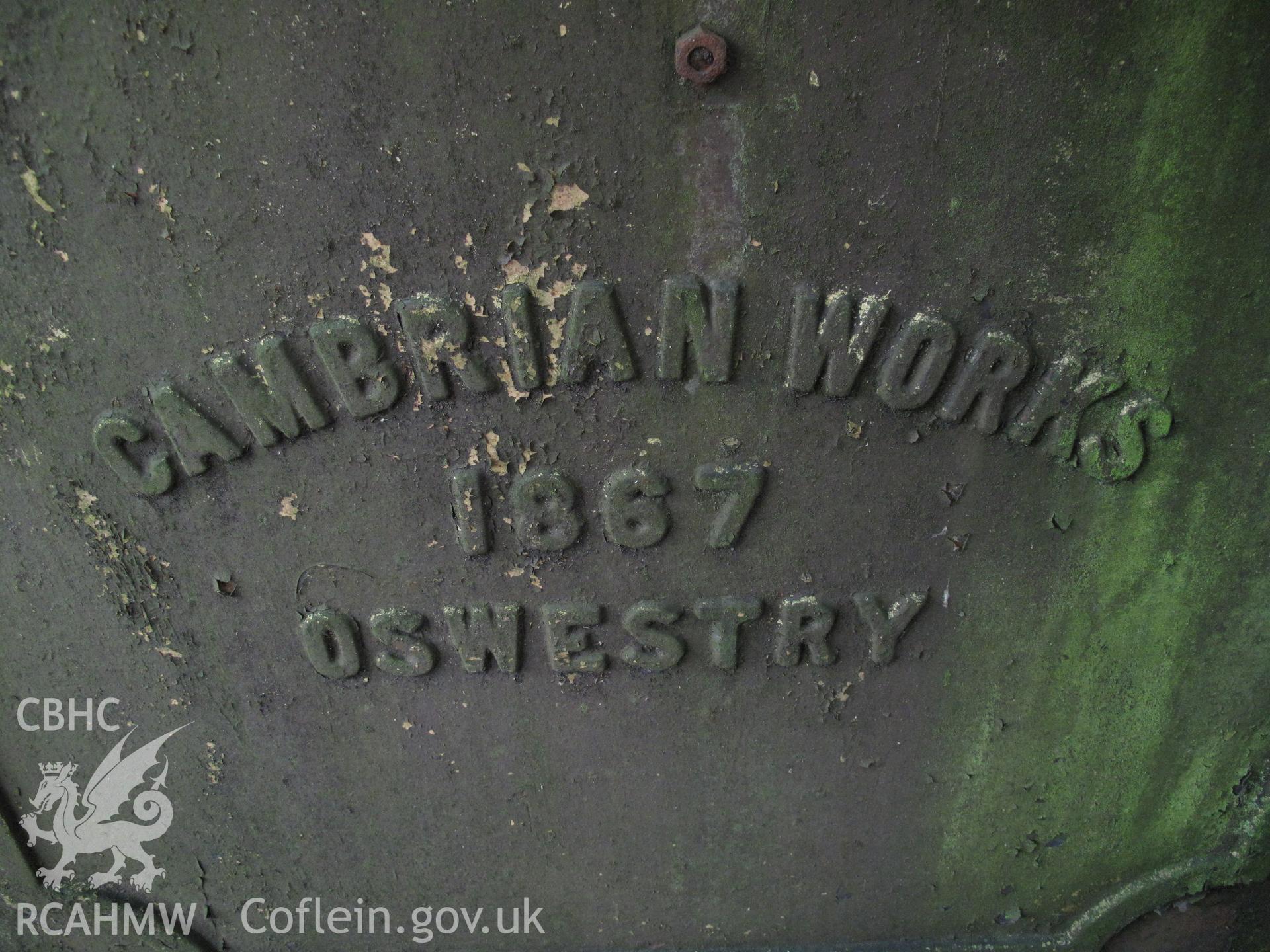 Detail of maker's name and date, locomotive water tank at Pont Llanio Railway Station.