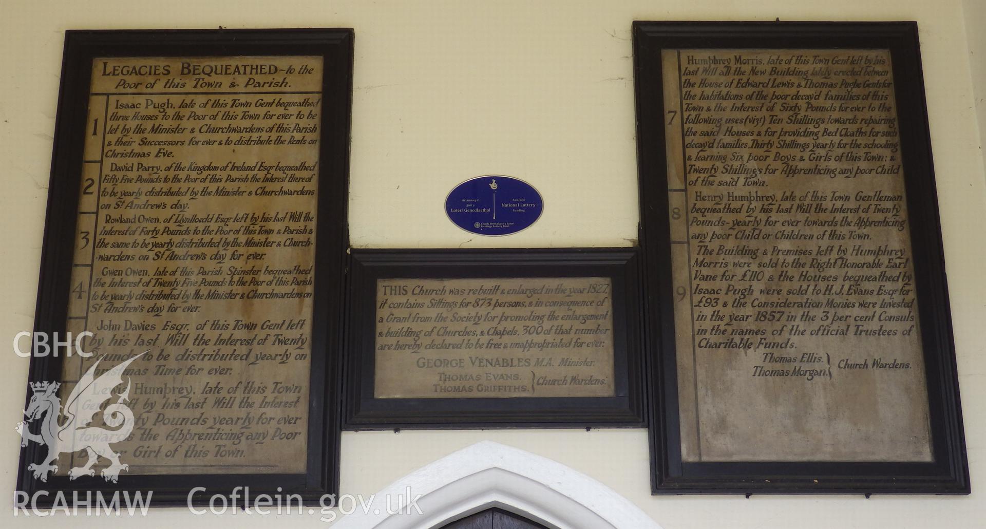 Boards recording bequests to the parish above the entrance door