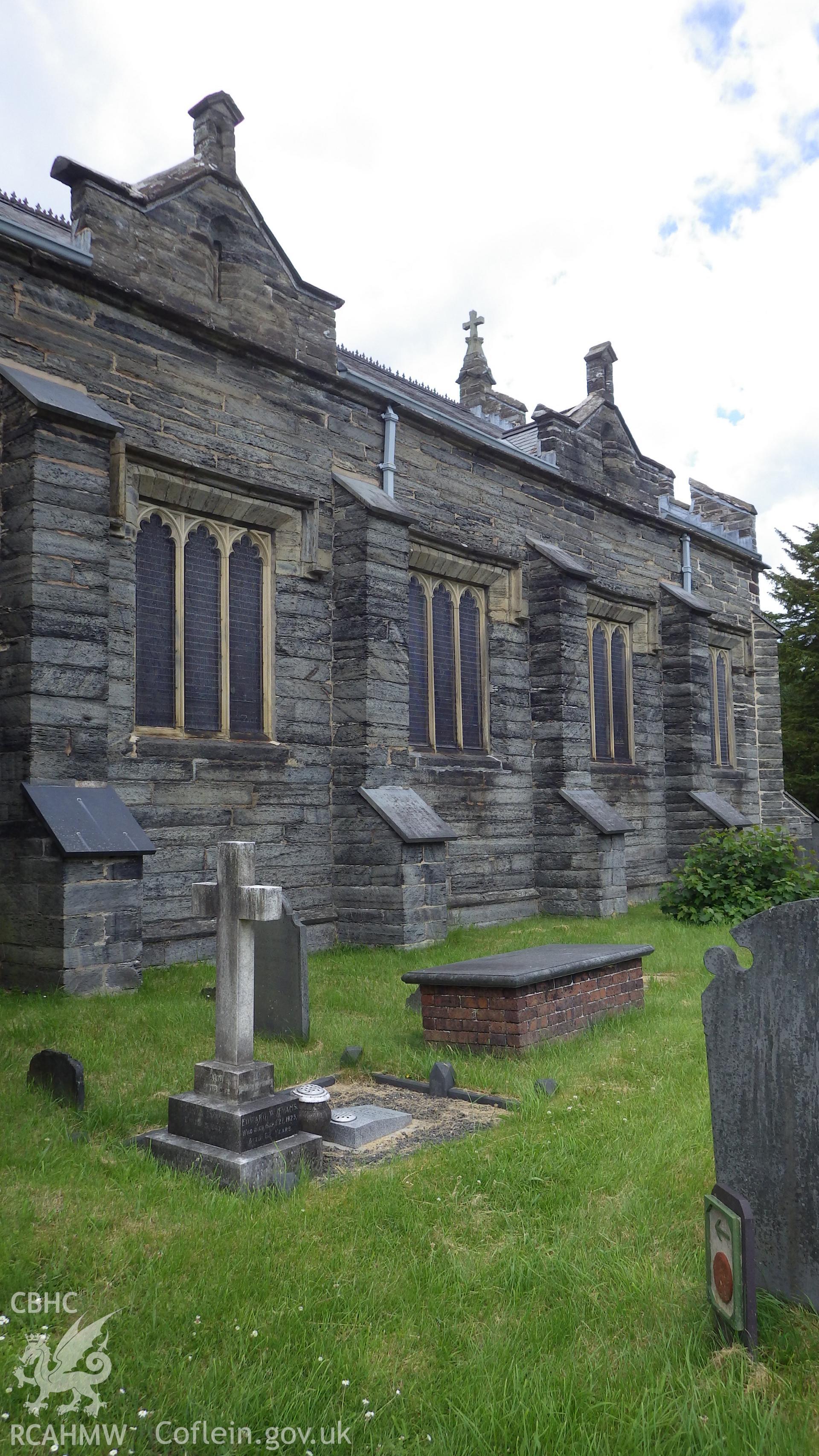 View of main body of church (nave) and butresses from southwest