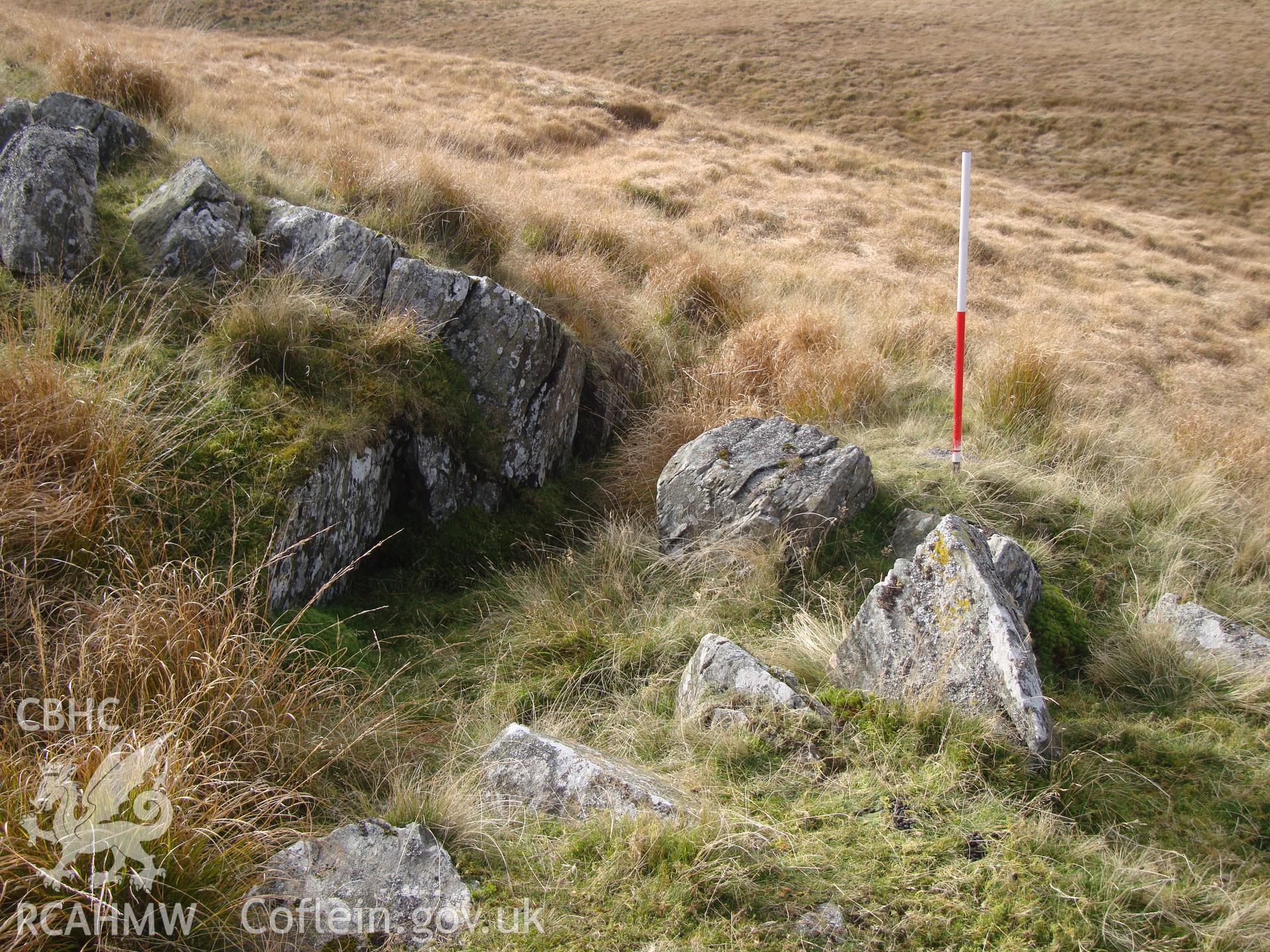 Leat cut through rock at SN8480769918, looking southwest.