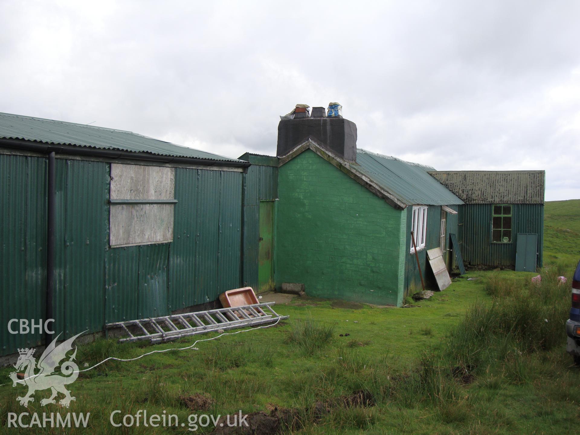 Building, looking southwest, with shed NPRN 503586 on the left hand side of the photograph.