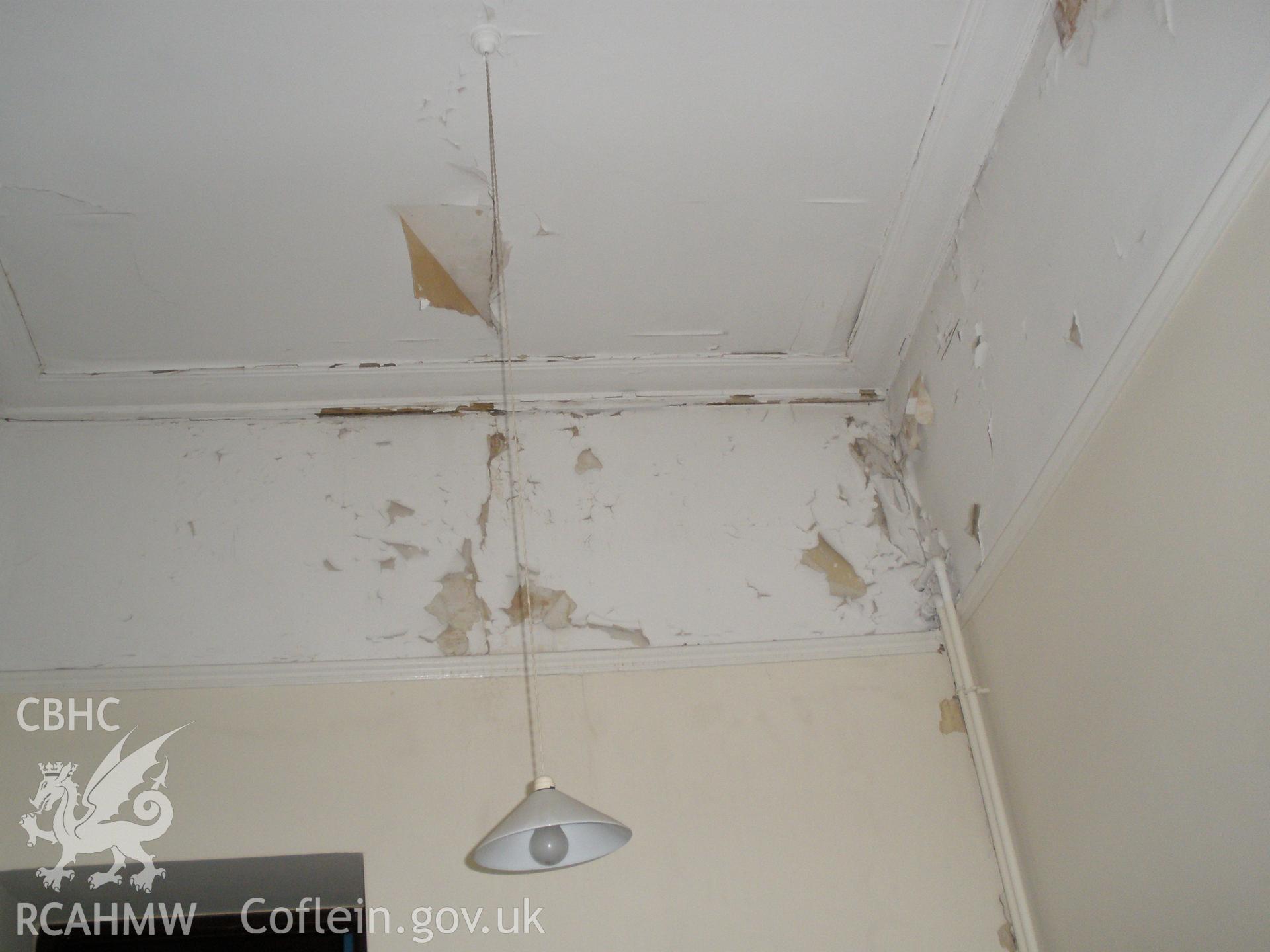 View of ground floor interior - plaster damage