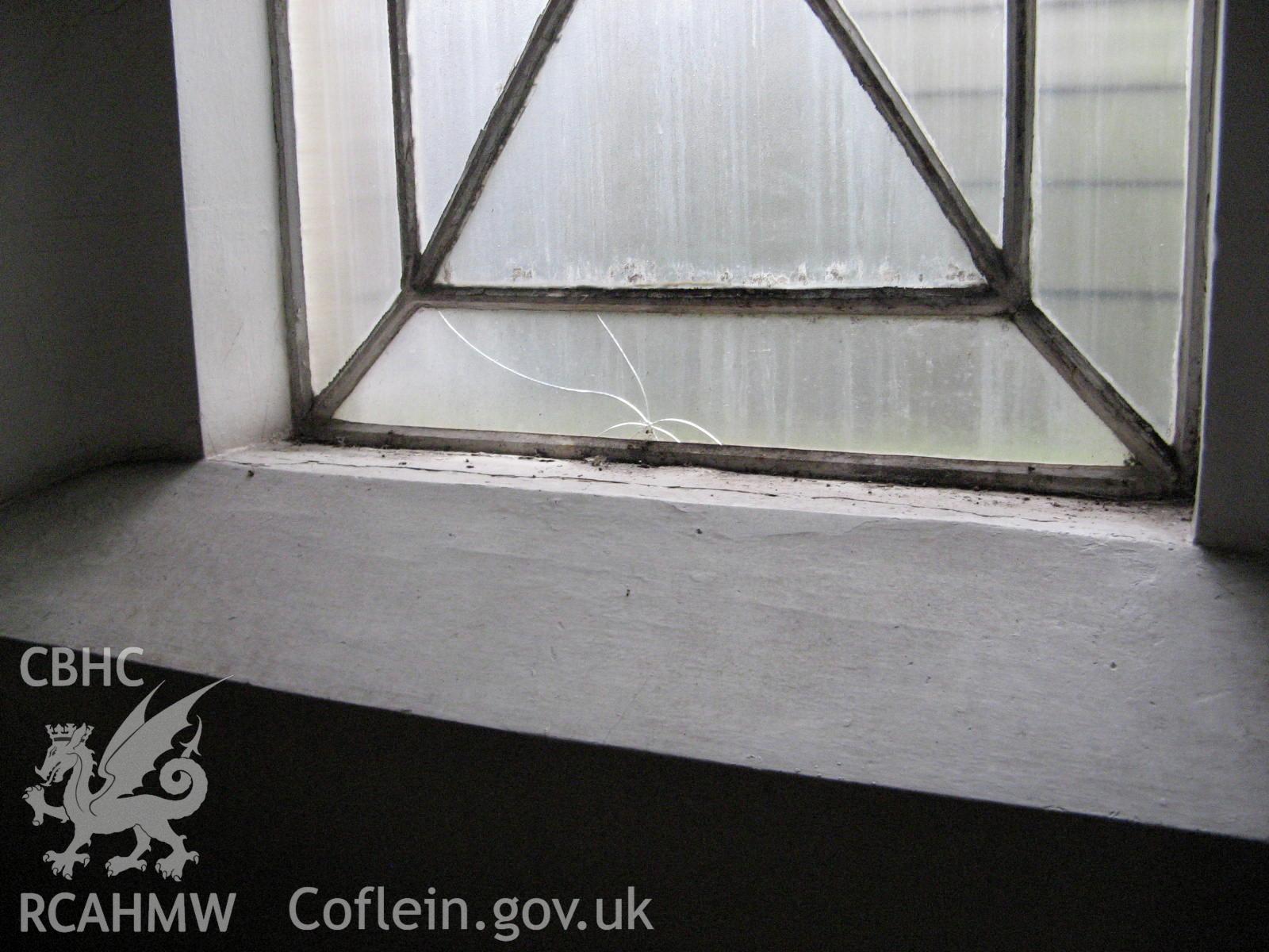 View of ground floor interior - metal window frame