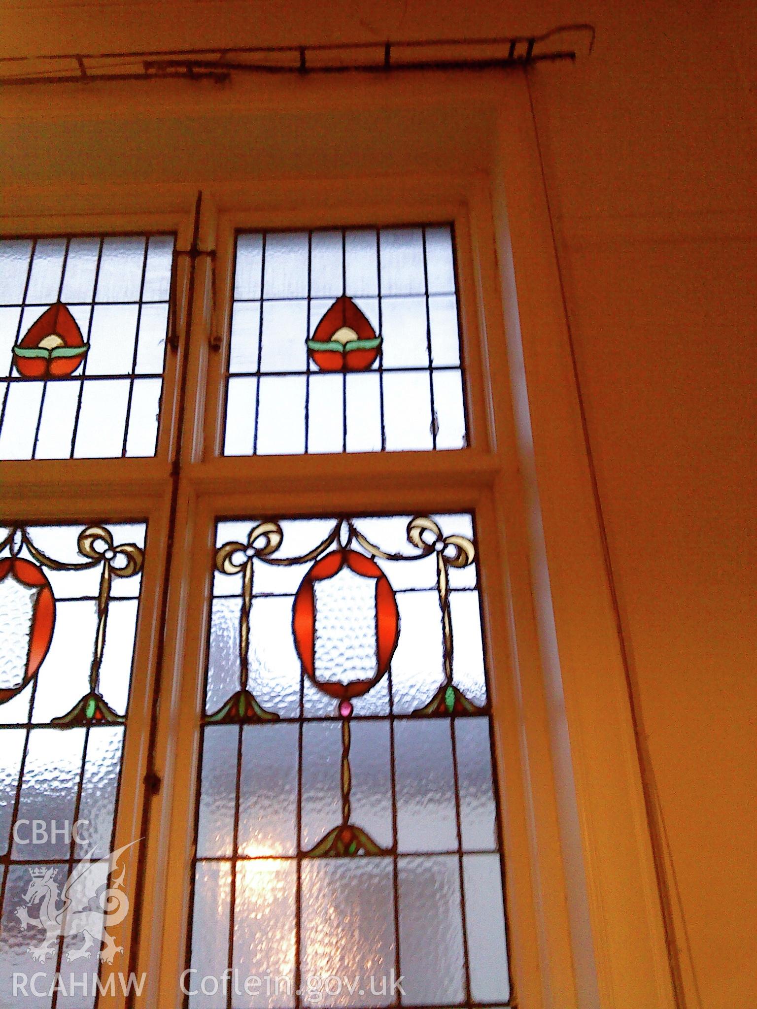 View of ground floor interior - stained glass window