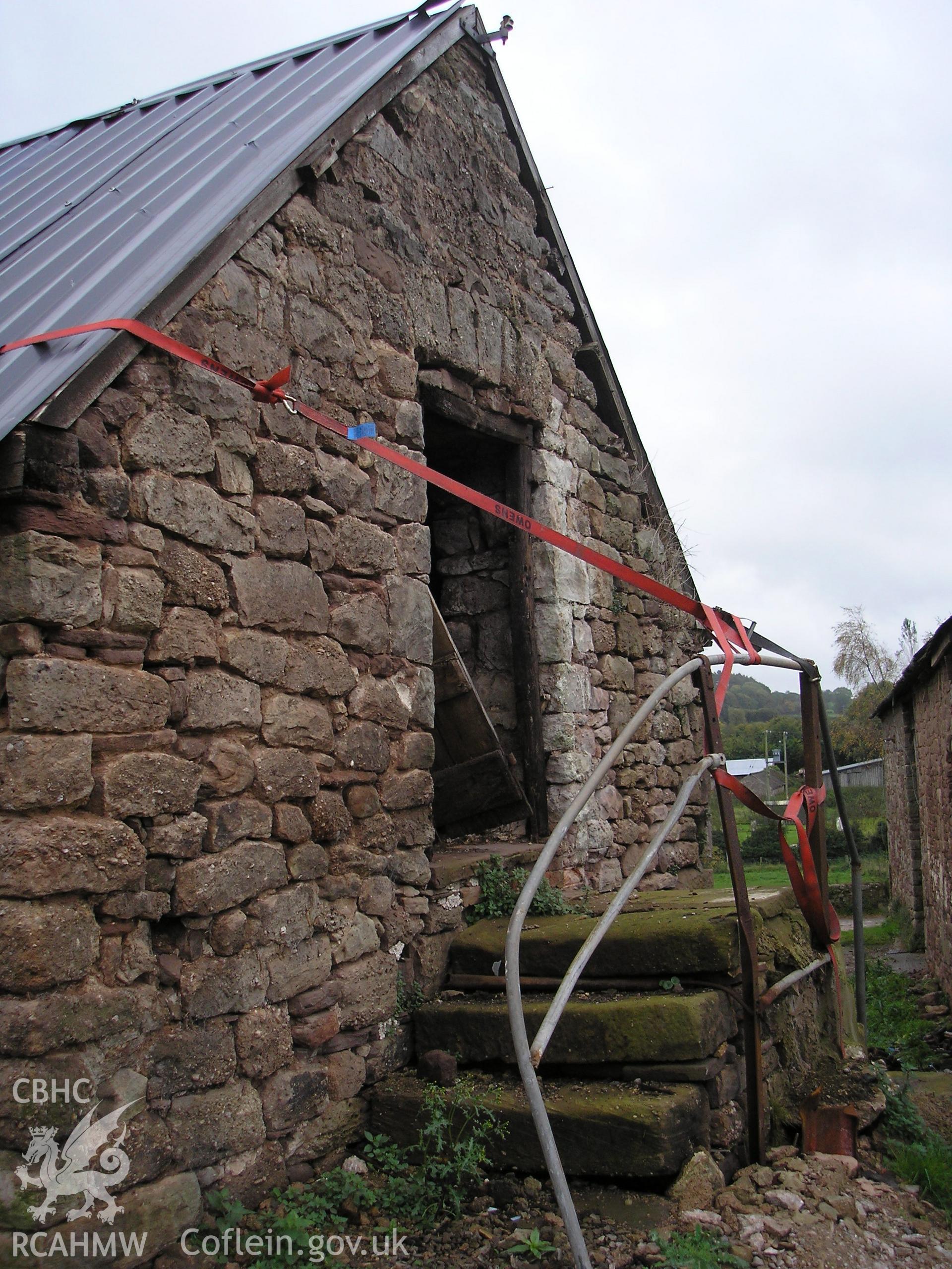 Exterior of barn showing stone steps